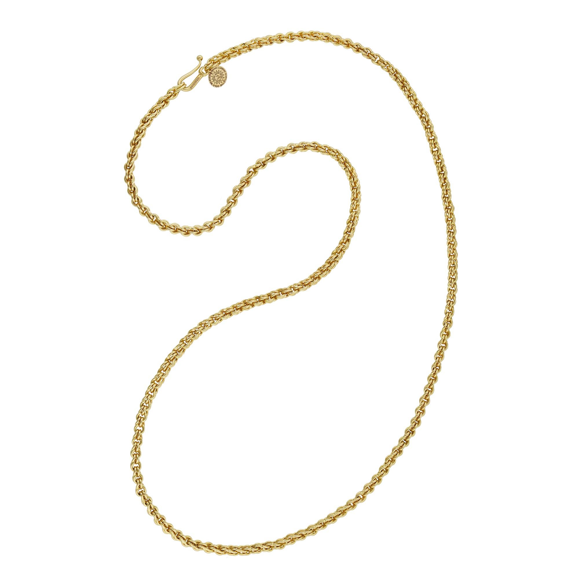 A handmade gold Little Minstrel chain by Lucie Heskett-Brem, the Gold Weaver of Lucerne, made in yellow gold with hook clasp, hallmarked 18ct gold London 2021, measuring 50.5cm long and 0.3cm wide,  gross weight 23.6 grams.

This chain is new.

A