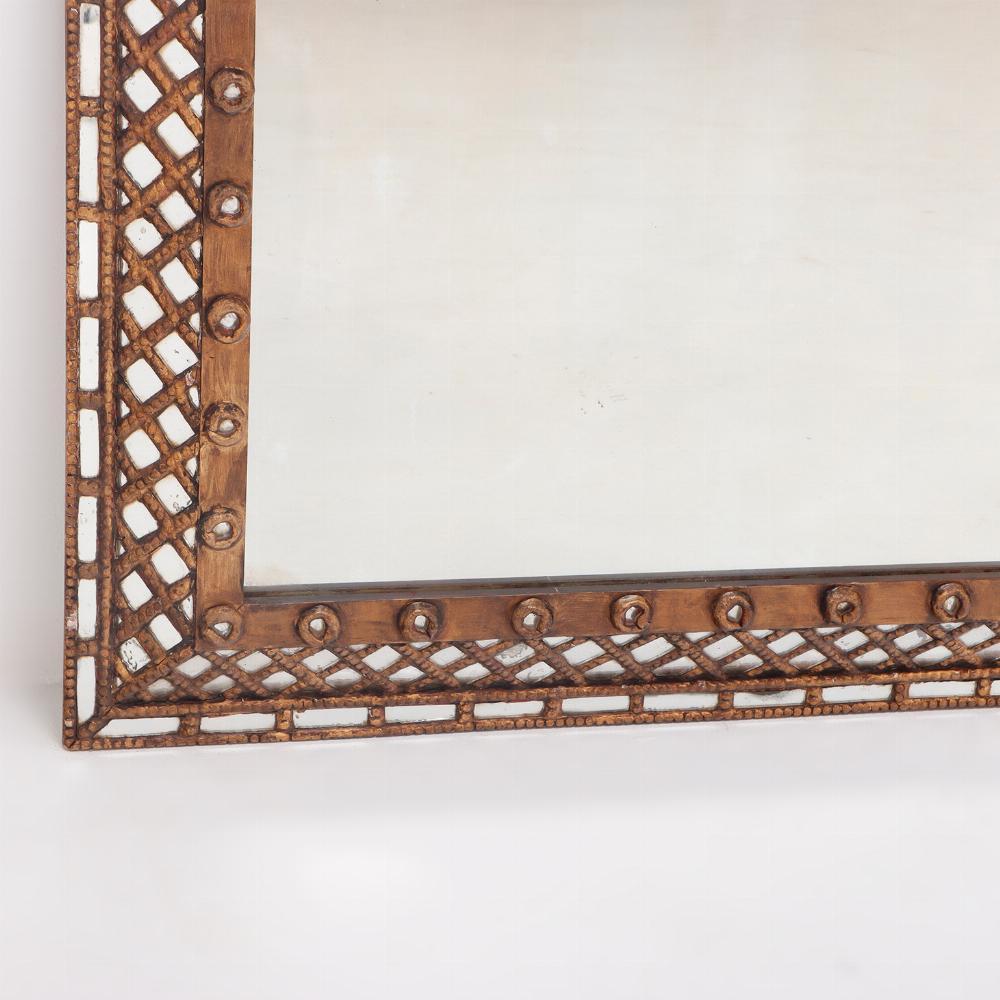 Mid-Century Modern A gold mirror with lattice design circa 1950. For Sale