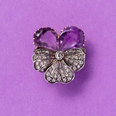A gold pansy brooch amethyst and diamond
