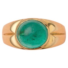 Gold Ring with a Cabochon Cut Colombian Emerald