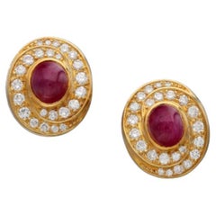 A Gold Ruby and Diamond Earclip 