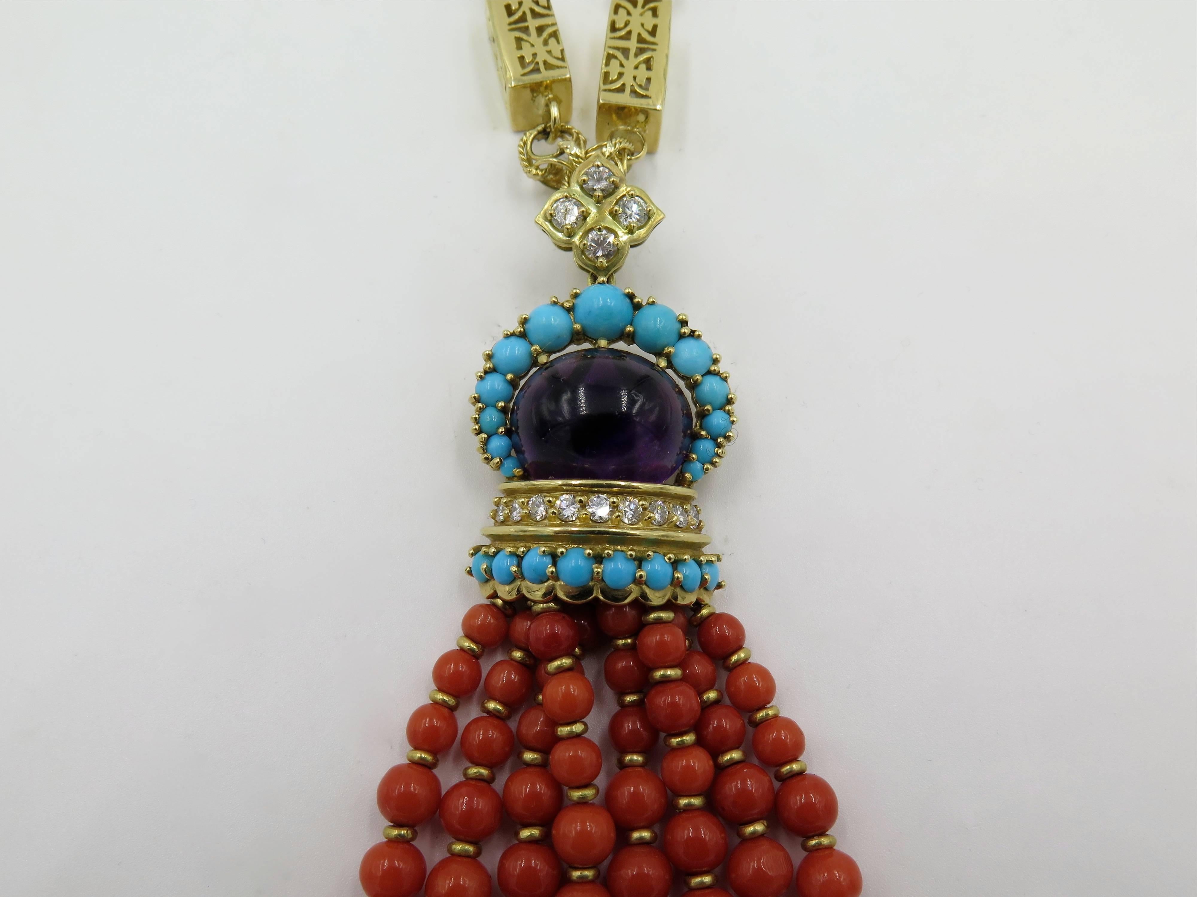 An 14 karat  yellow gold, gem set and diamond tassel pendant and 14 karat yellow gold chain. Circa 1970. The pendant of Mogal inspired design, designed as a graduated coral and amethyst bead fringe, from a cabochon amethyst and turquoise surmount,