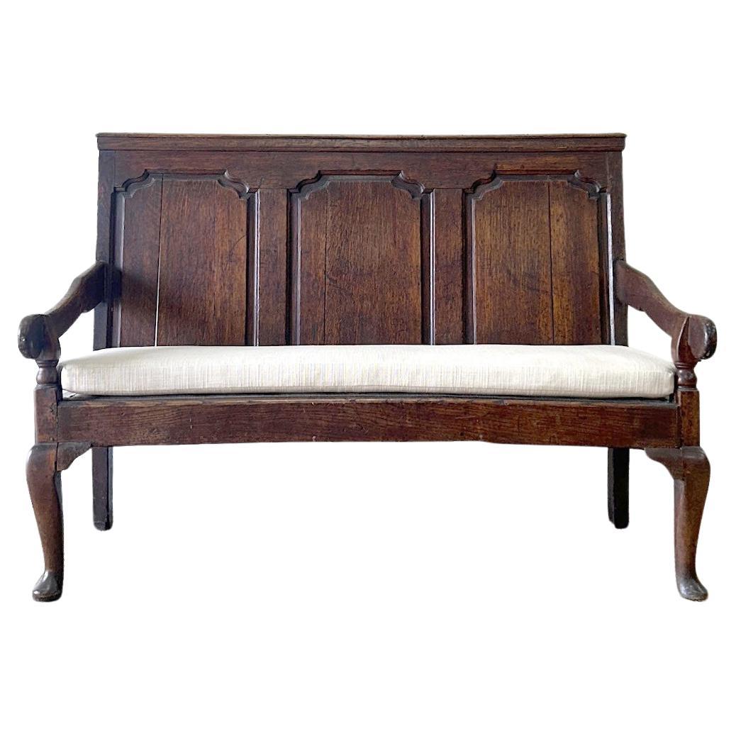 A Good 19th Century English Oak Settle with Freshly Upholstered Seat