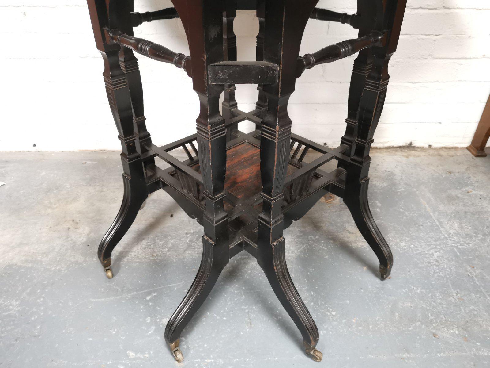 Lambs of Manchester An Aesthetic Movement ebonized Walnut eight leg centre table For Sale 7