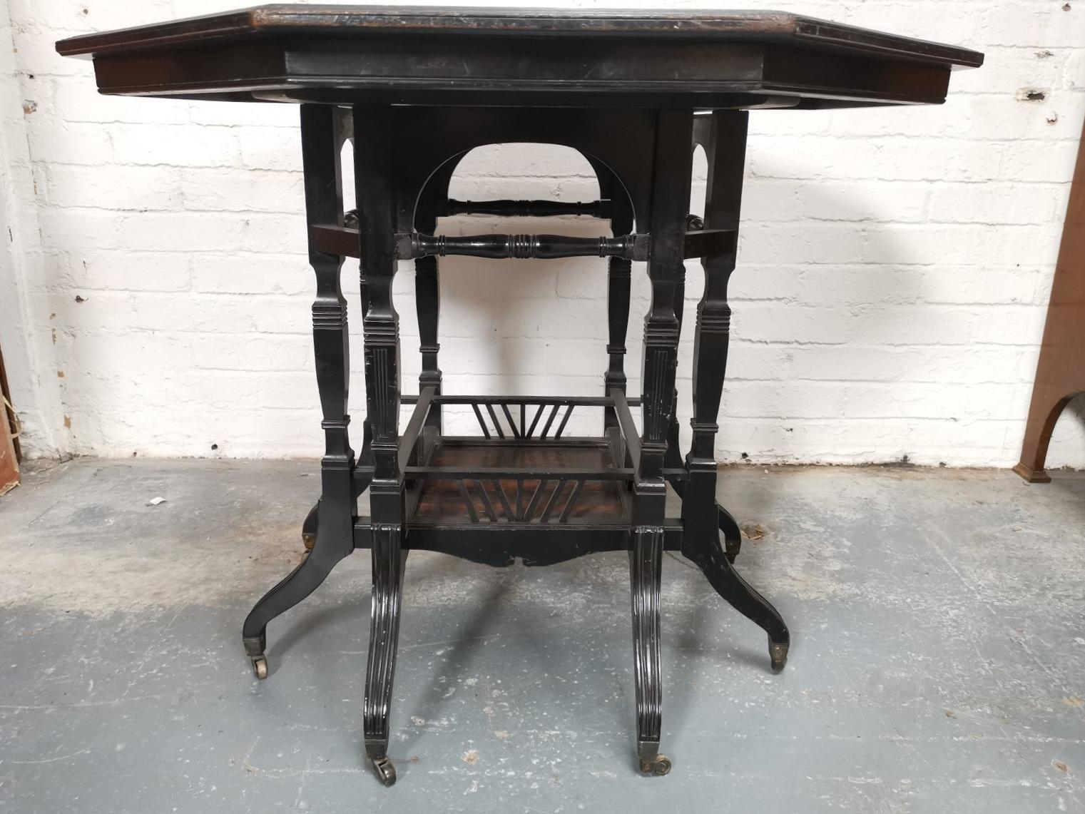 Lambs of Manchester An Aesthetic Movement ebonized Walnut eight leg centre table For Sale 1