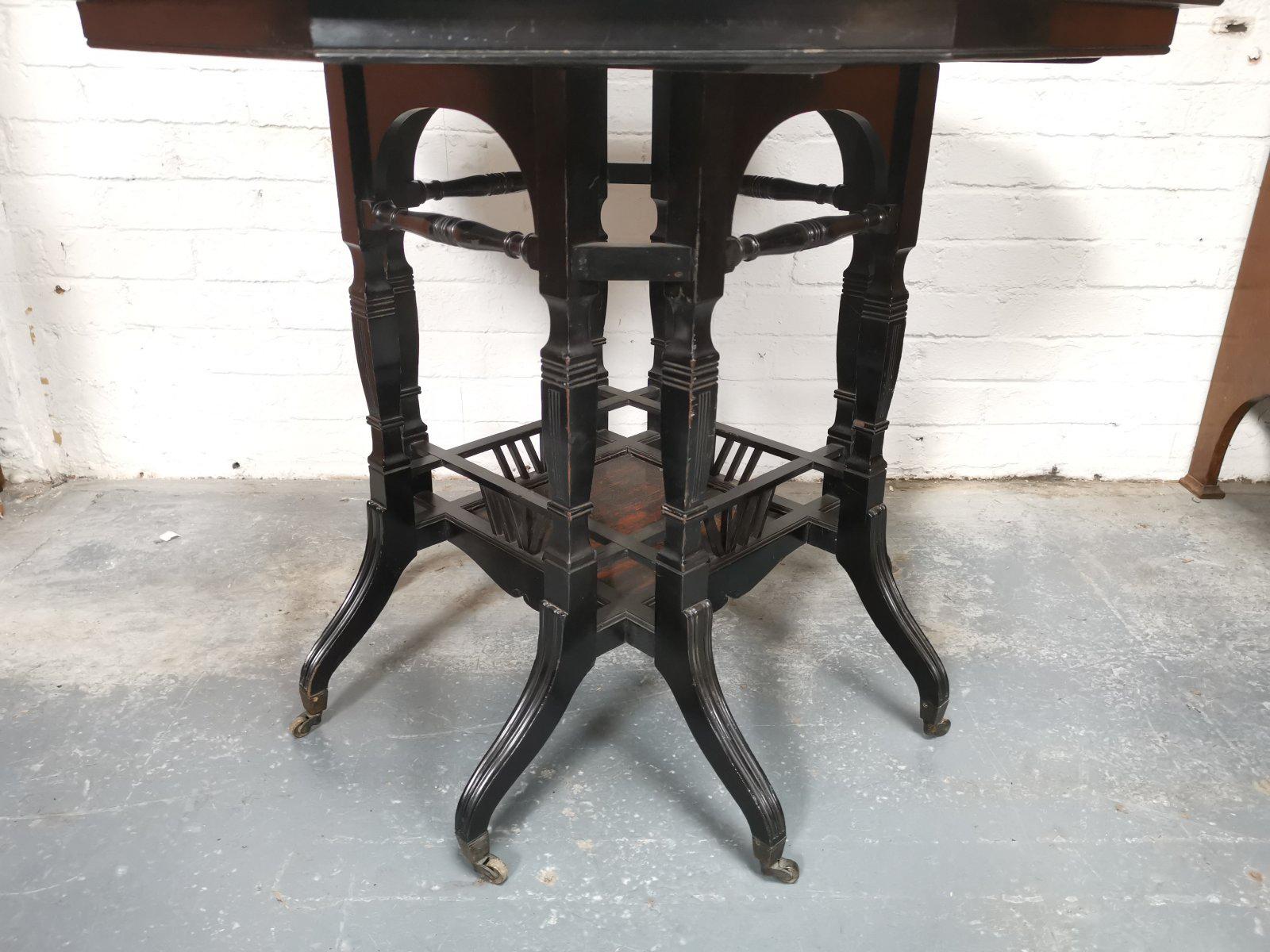 Lambs of Manchester An Aesthetic Movement ebonized Walnut eight leg centre table For Sale 6