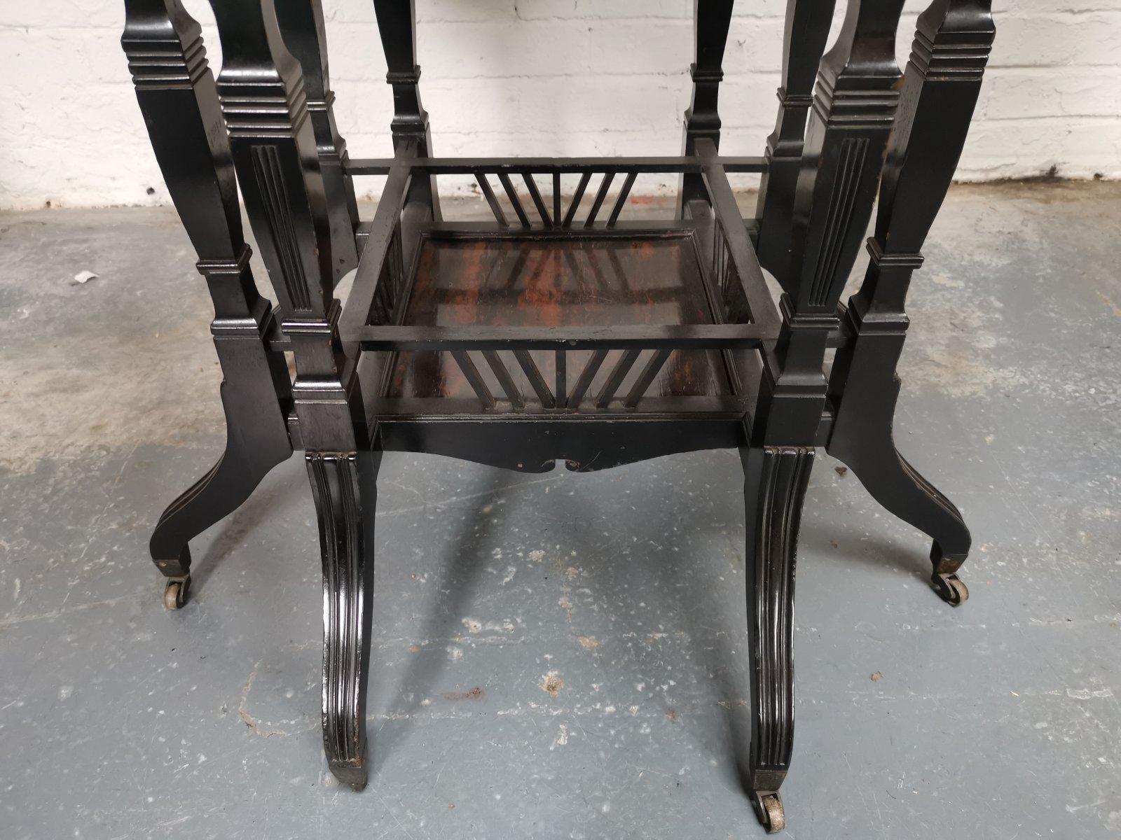Lambs of Manchester An Aesthetic Movement ebonized Walnut eight leg centre table For Sale 3