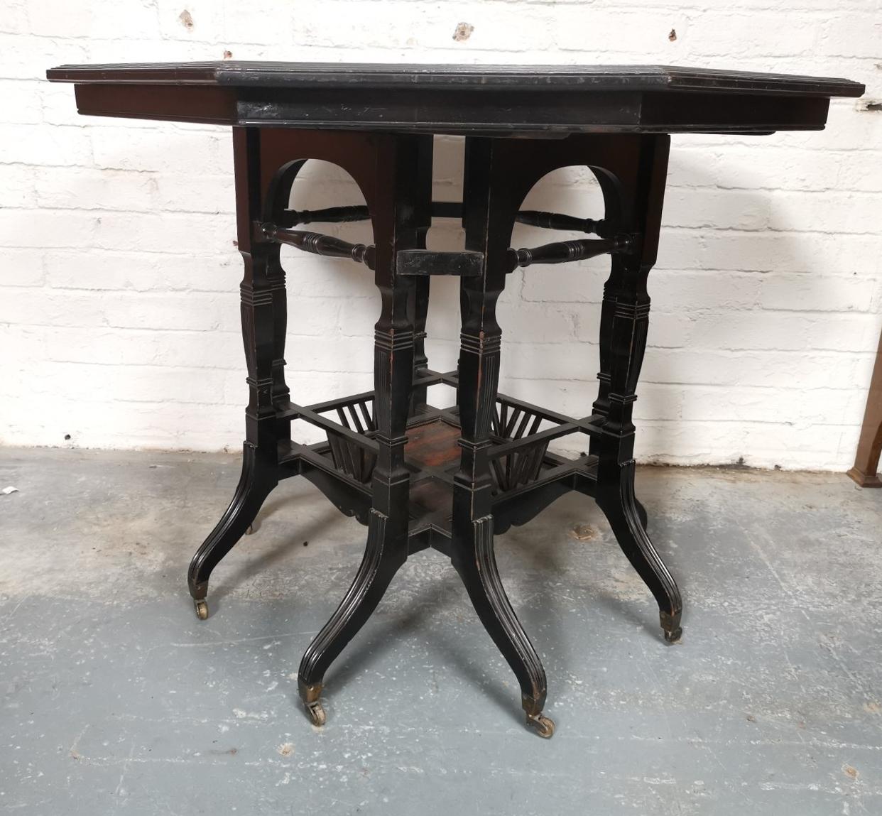Lambs of Manchester An Aesthetic Movement ebonized Walnut eight leg centre table For Sale 5