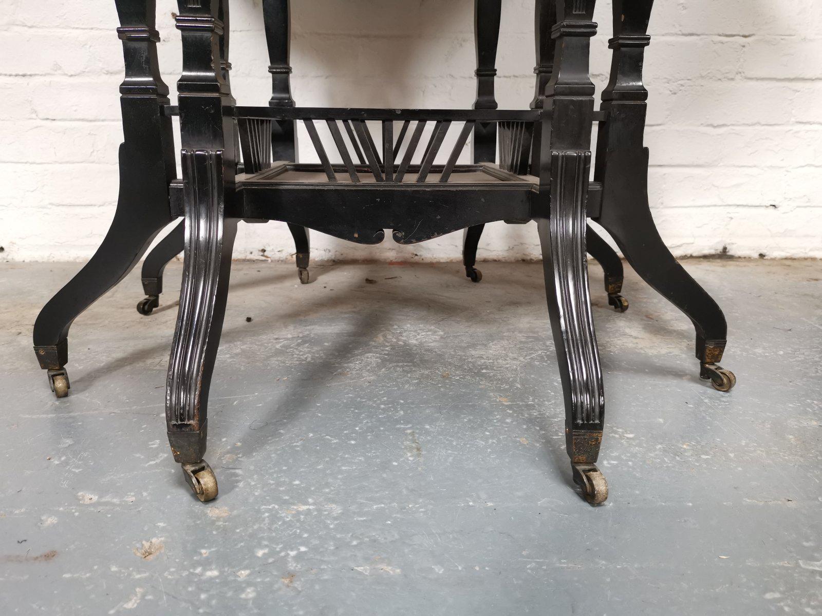 Lambs of Manchester An Aesthetic Movement ebonized Walnut eight leg centre table For Sale 4