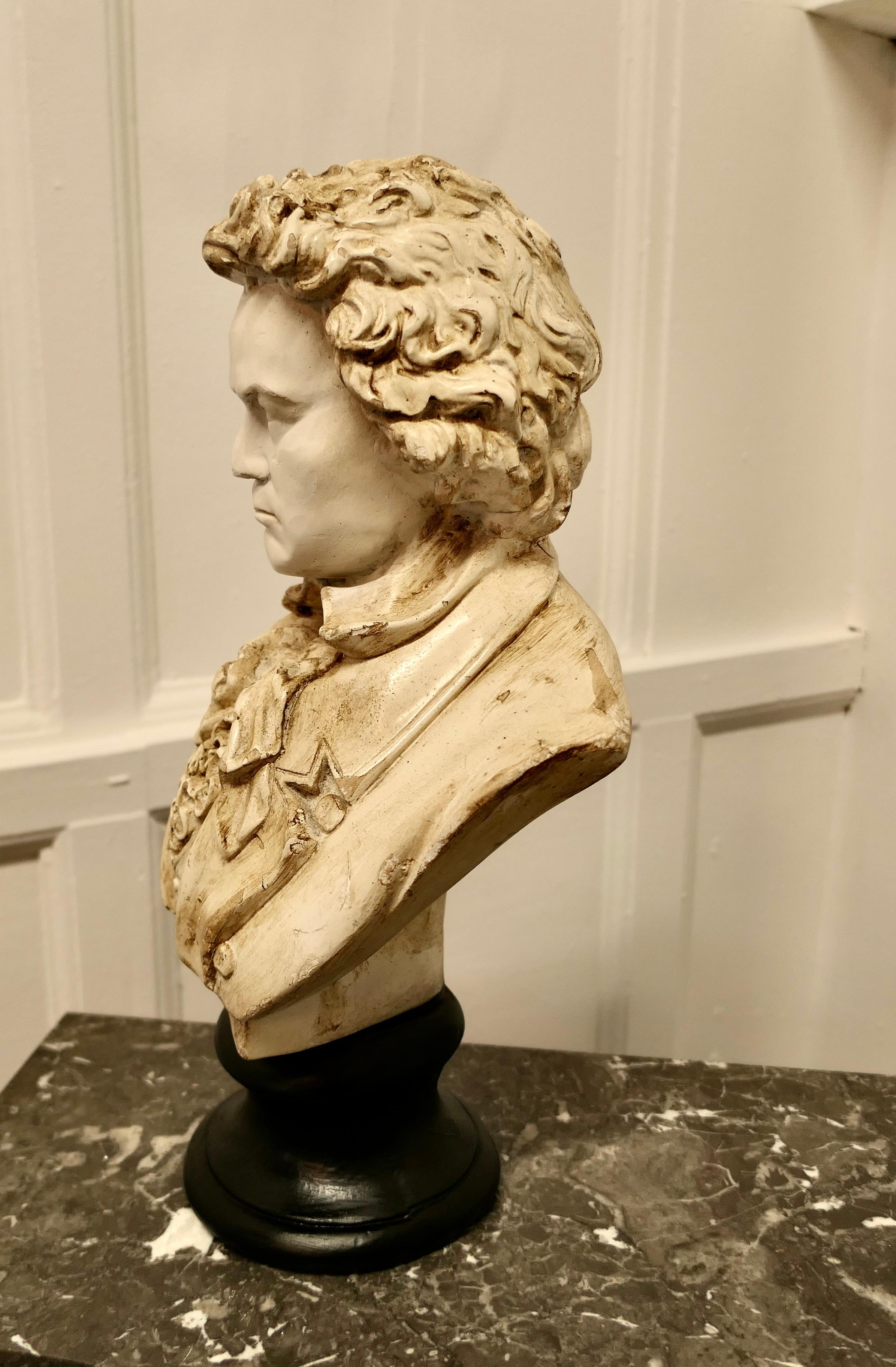 A good aged bust of Ludwig van Beethoven


A Good Bust of Beethoven, the bust is made on Gesso over plaster it set on a turned black socle base, it is an elegant likeness of the Composer
 

The Statue is 17” high and 11” across at his