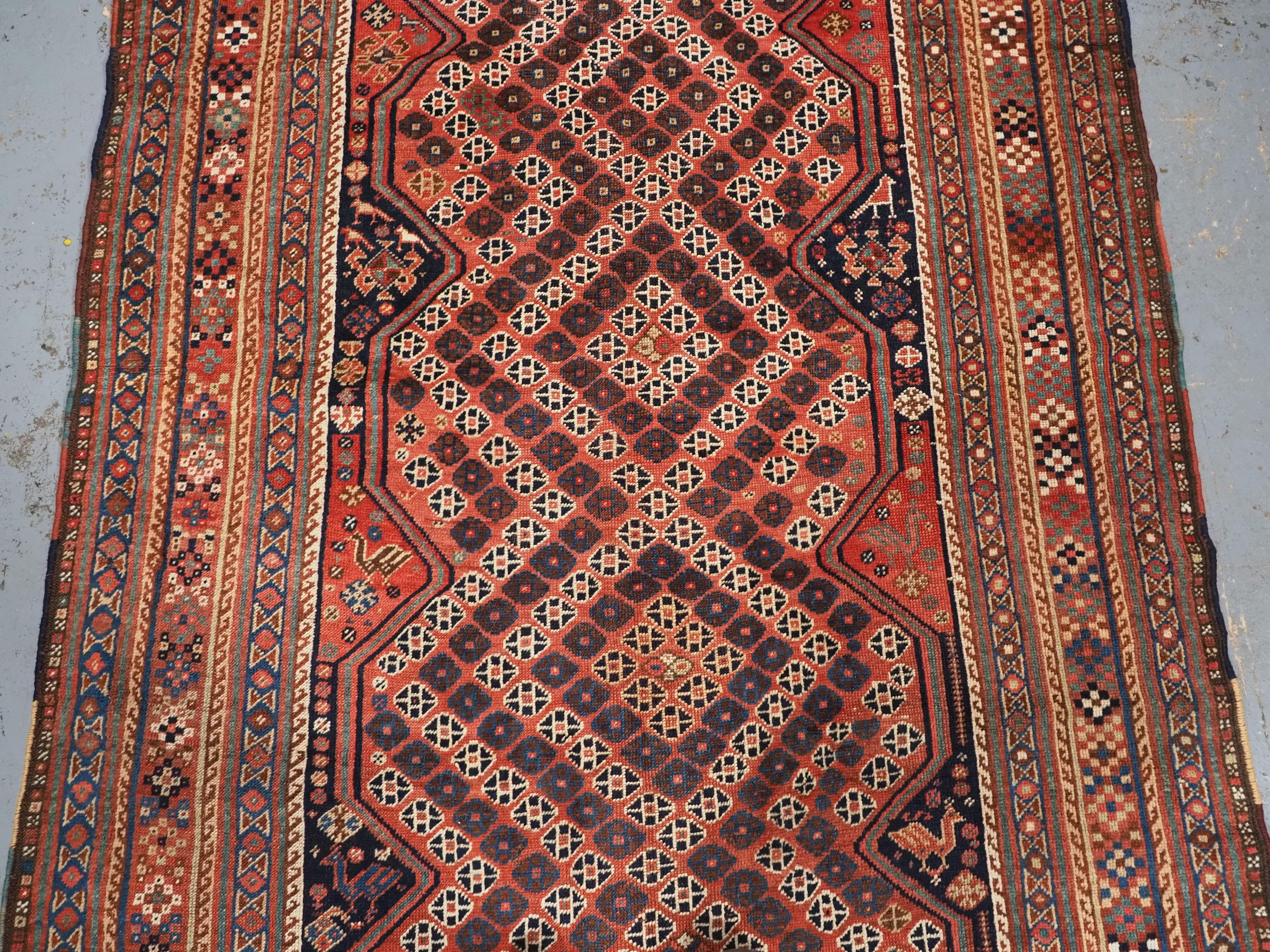 A good Antique Tribal Qashqai rug with diamond lattice design.  Circa 1880. In Good Condition For Sale In Moreton-In-Marsh, GB