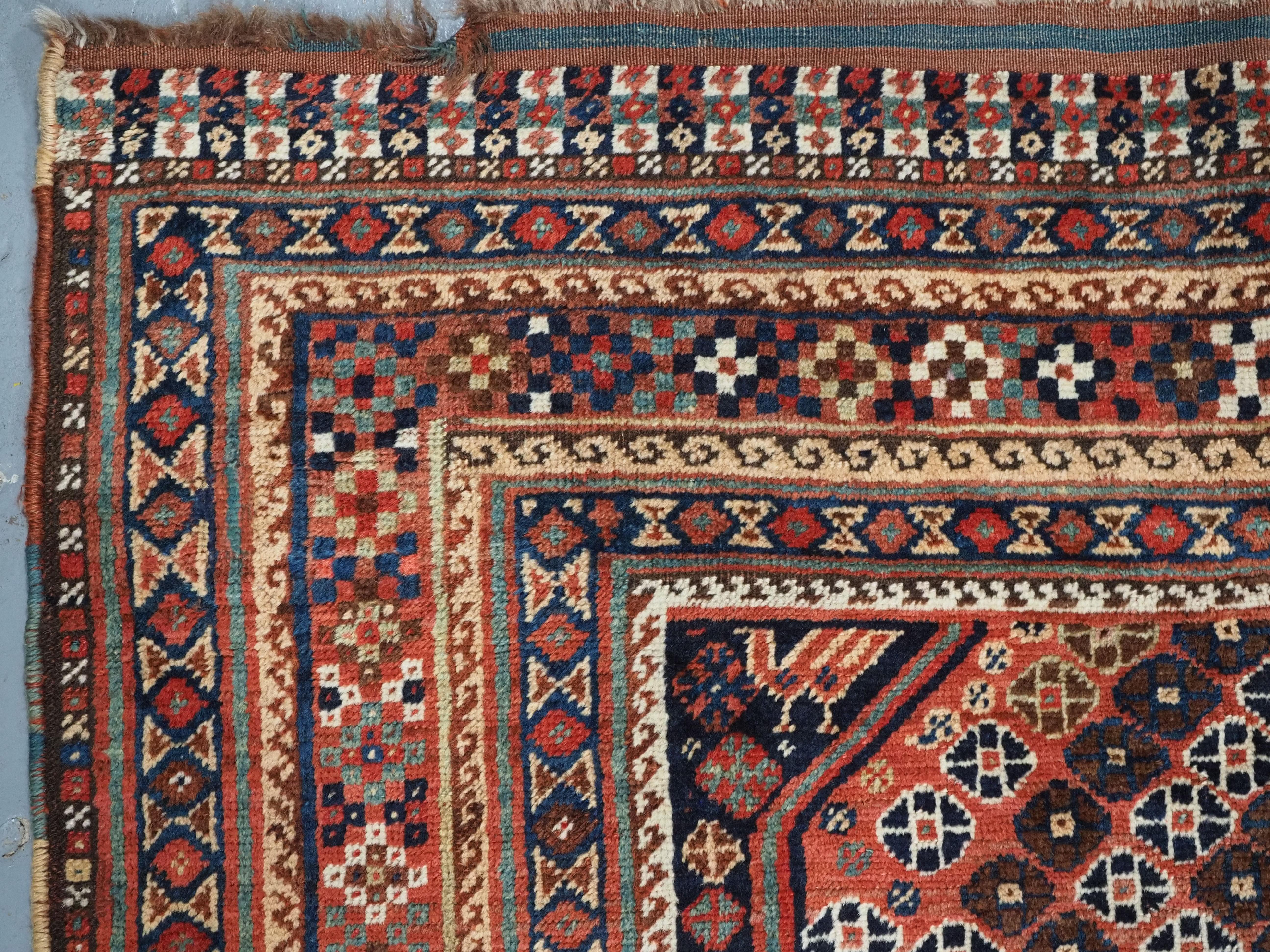 Wool A good Antique Tribal Qashqai rug with diamond lattice design.  Circa 1880. For Sale