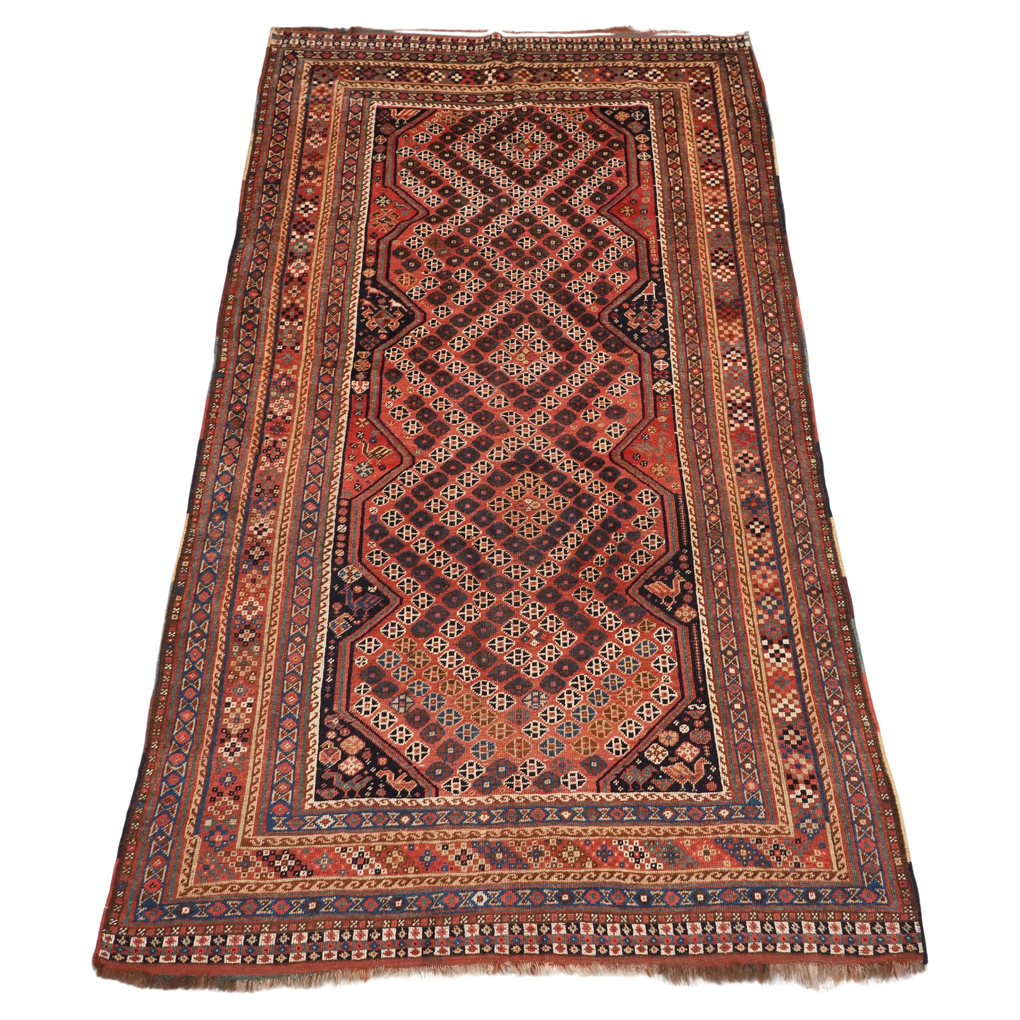 A good Antique Tribal Qashqai rug with diamond lattice design.  Circa 1880. For Sale