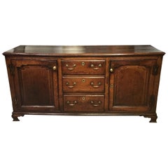 A good George III Period oak Westmoreland dresser base