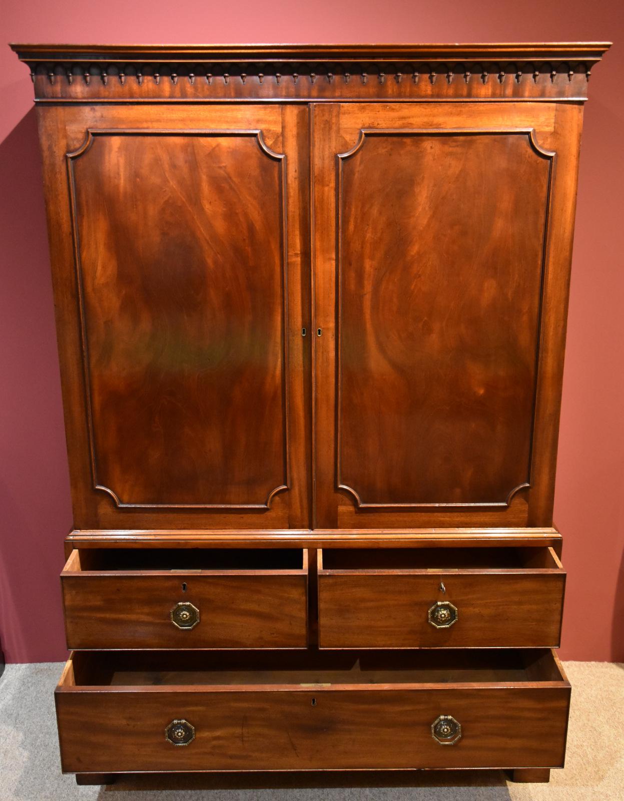 A superb mid-18th century mahogany linen press of superb color. The interior has been converted into half hanging and half trays.

Dimensions:
Height 72.5