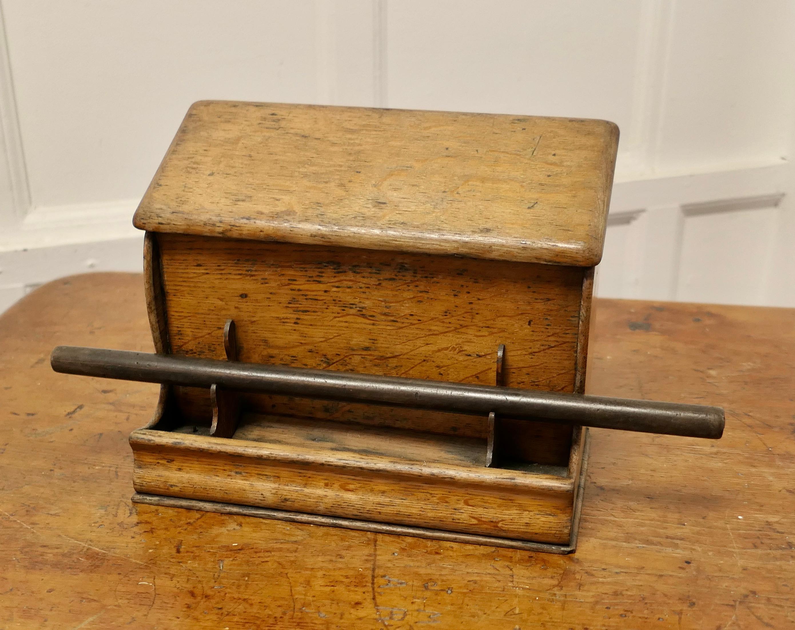 A Good Old Oak Stationary or Letter Box, with pen Holder

This is a very useful piece, the box is made in oak, it has 6 graduated letter compartments inside and a pen or ruler holder on the front
 
The Box is 12” wide, it is 10” high and 7”