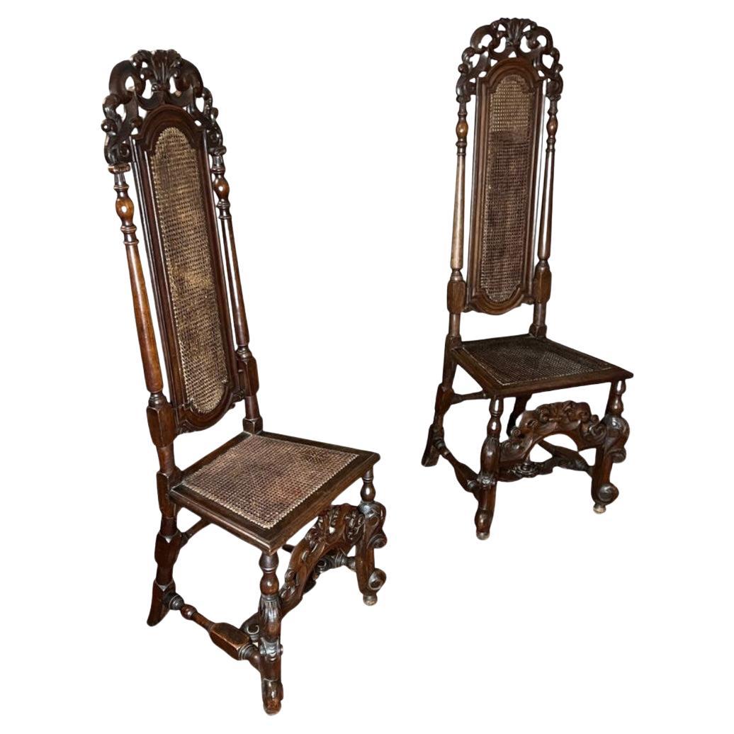 A good pair of Charles II-period carved walnut chairs 