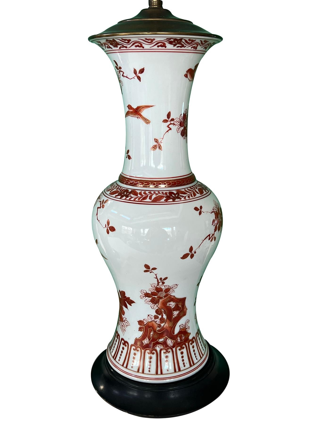 Mid-20th Century A Good Pair of Chinese Export-style Floral Decorated Vases Mounted as Lamps For Sale