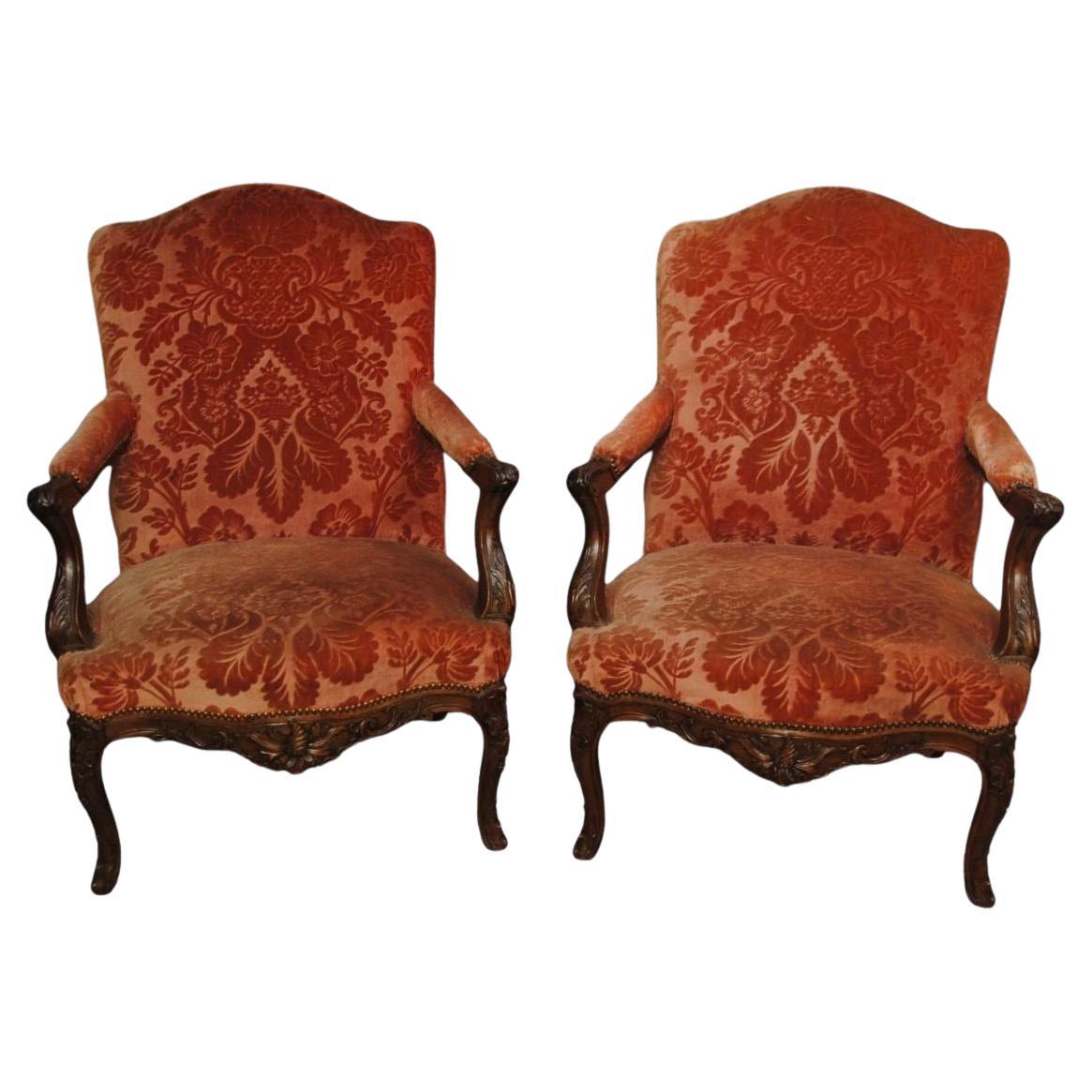 A Good Pair of French Carved Walnut Open Armchairs