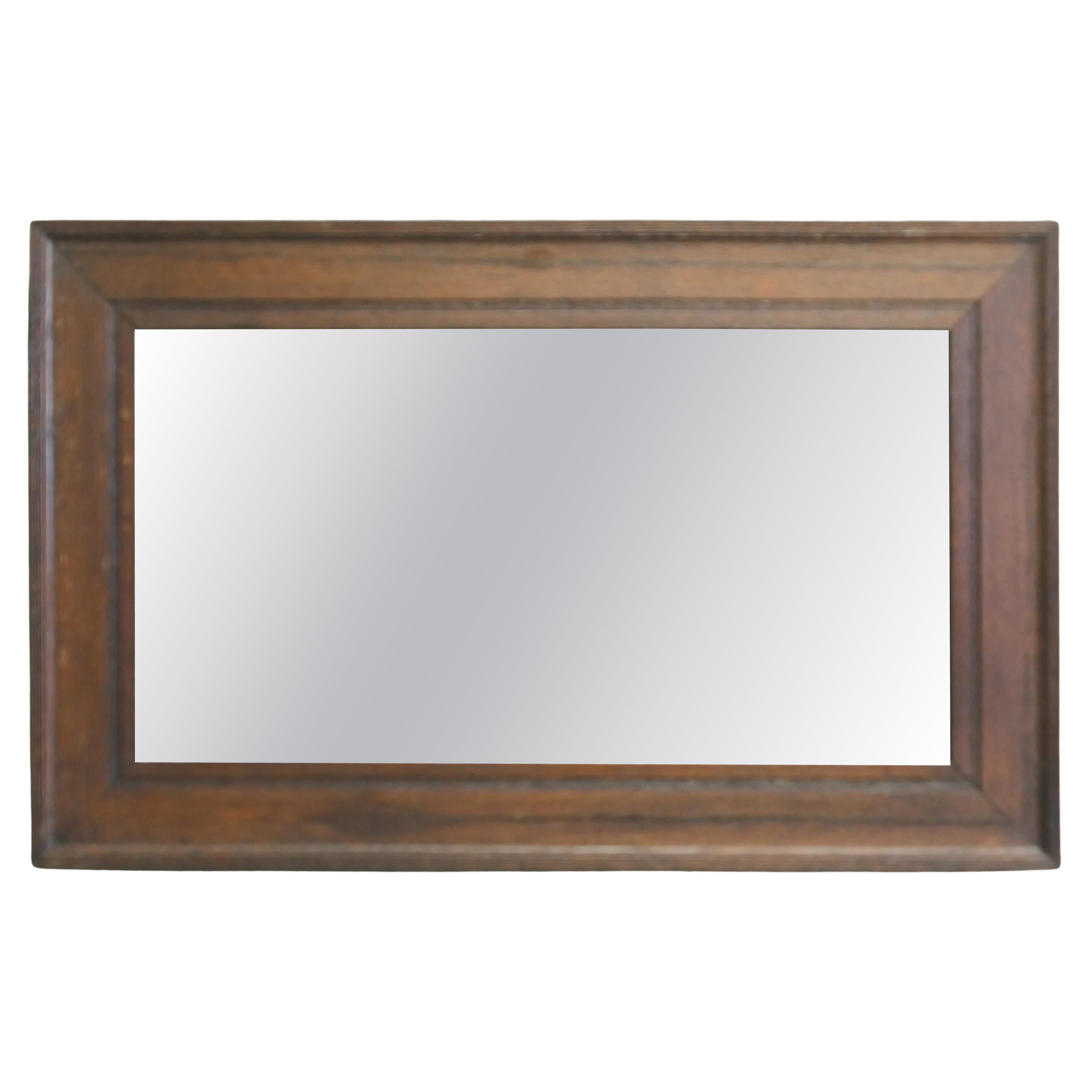 Miroir mural en Oak Oak du 19ème siècle avec un cadre en chêne moulé. en vente
