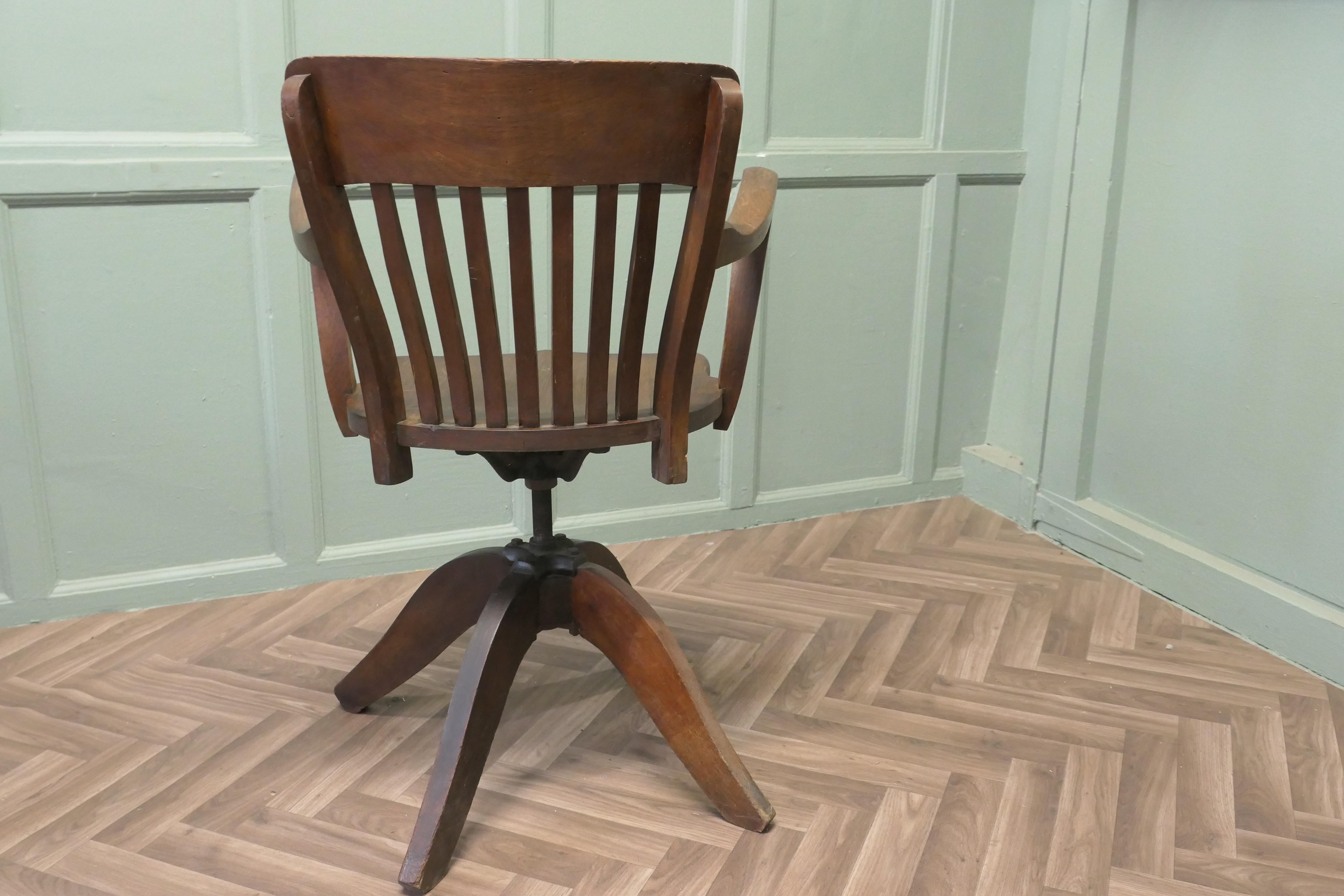 Oak A Good Quality Art Deco Desk Chair The Chair has an attractive deep curving back For Sale