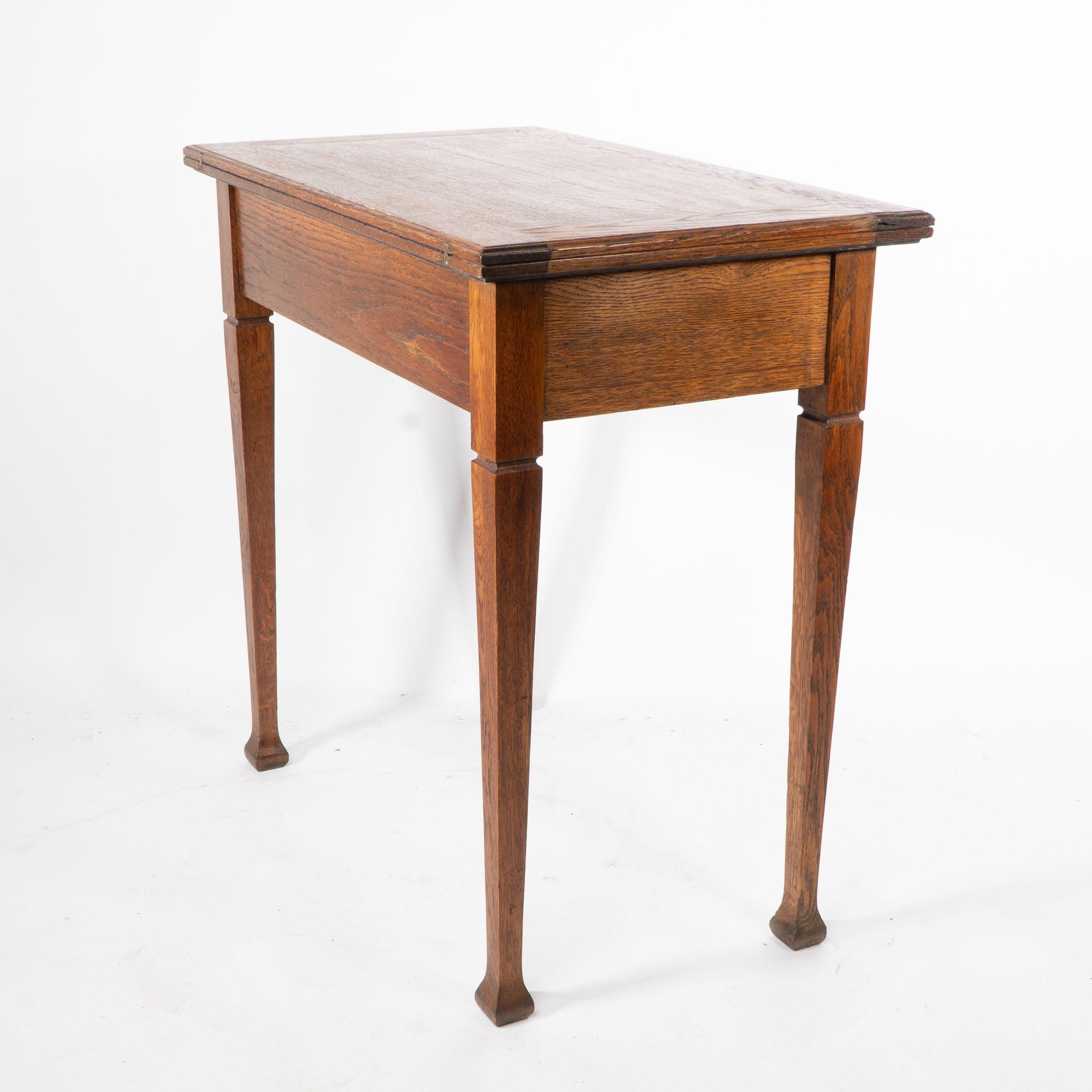 A good quality Arts and Crafts single drawer card or games table For Sale 1
