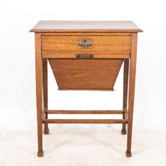 A good quality Glasgow Style Arts and Crafts oak needlework box