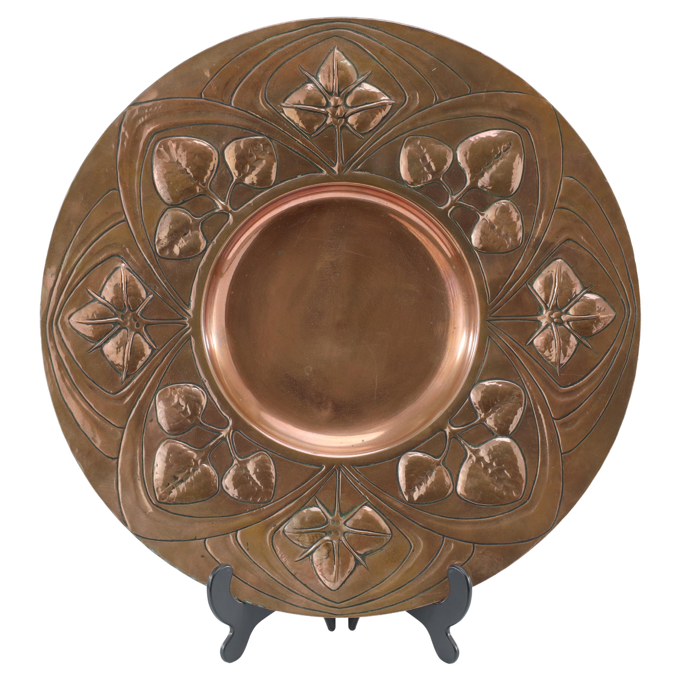 A good quality well executed Arts and Crafts copper wall plate #2 For Sale