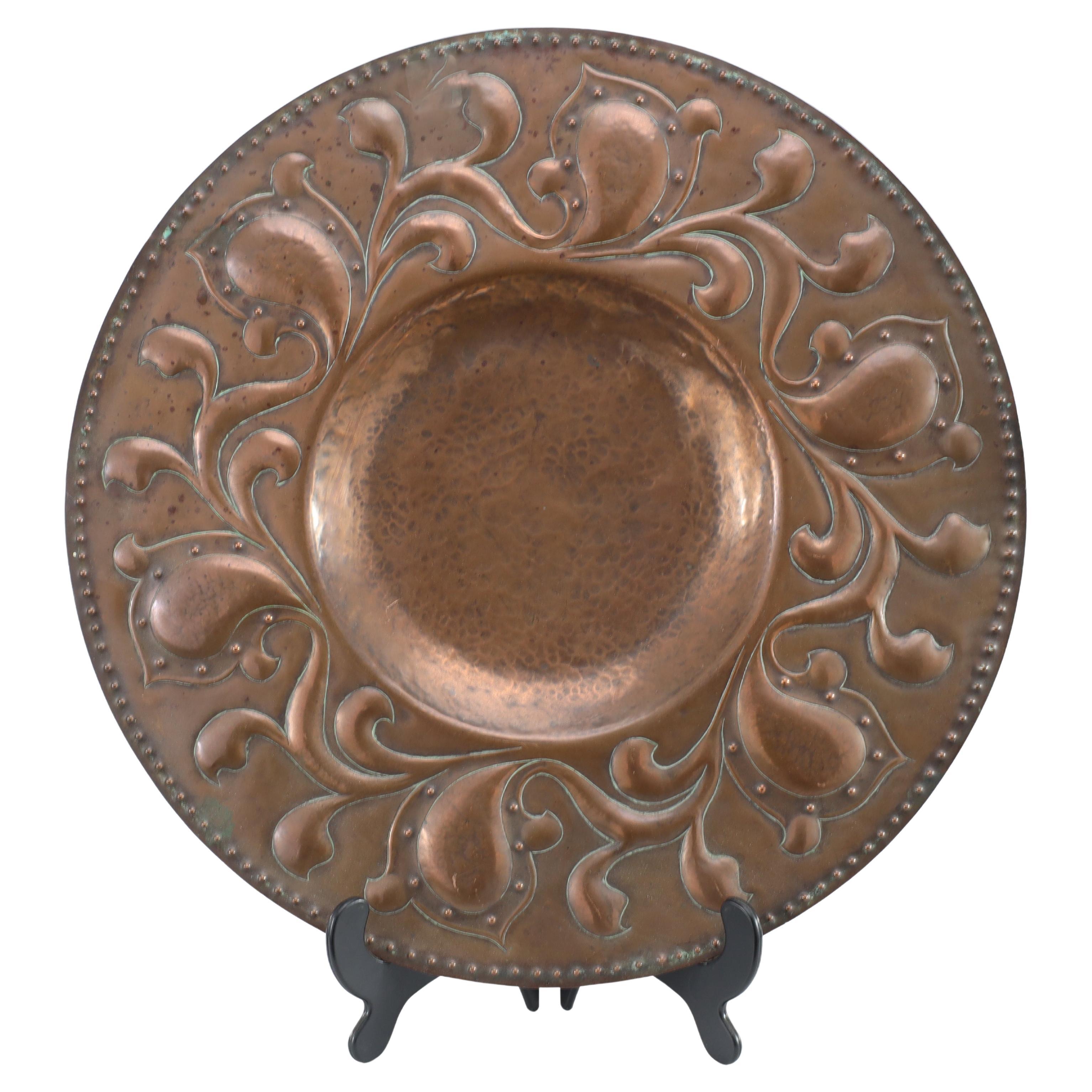 A good quality well executed Arts and Crafts copper wall plate For Sale