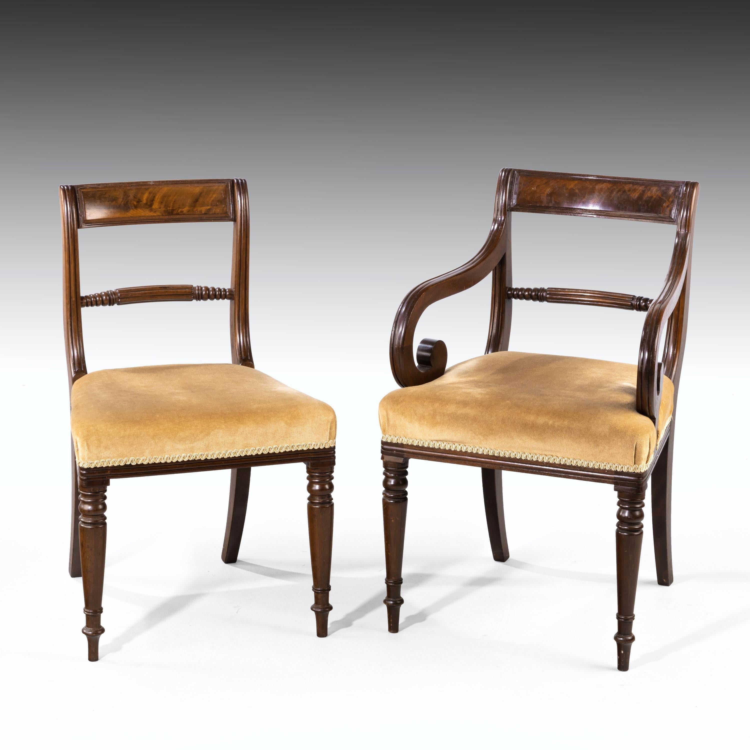 A good and original set 4+2 Regency period mahogany framed chairs. With arms with strongly reeded decoration and on turned supports.
Seat height 19