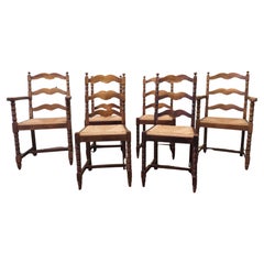 A Good Set of Wavy Ladder Back Dining Chairs  This is a very attractive set