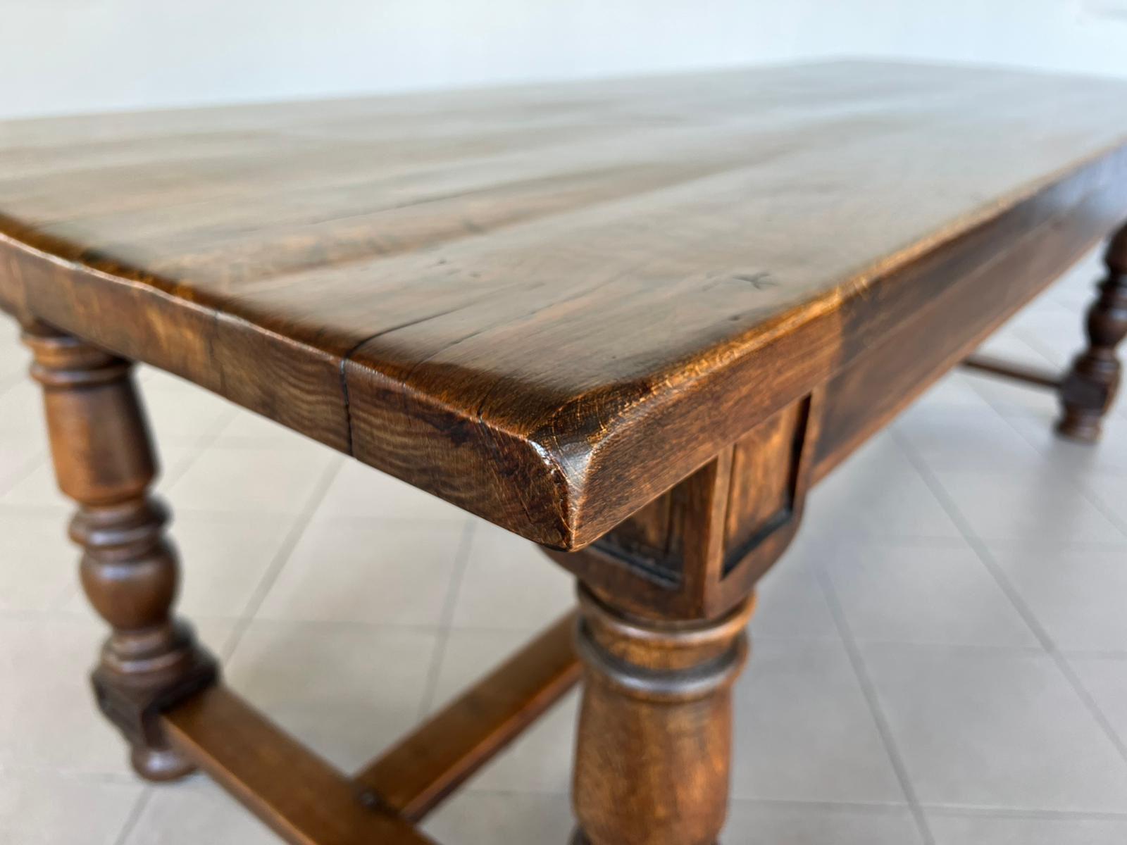 A good solid oak Farmhouse dining table having original colour and patina. French in origin and dating to the early 1900s, this table is of very good quality construction and will be around for generations to come.
The top cones off for easy access