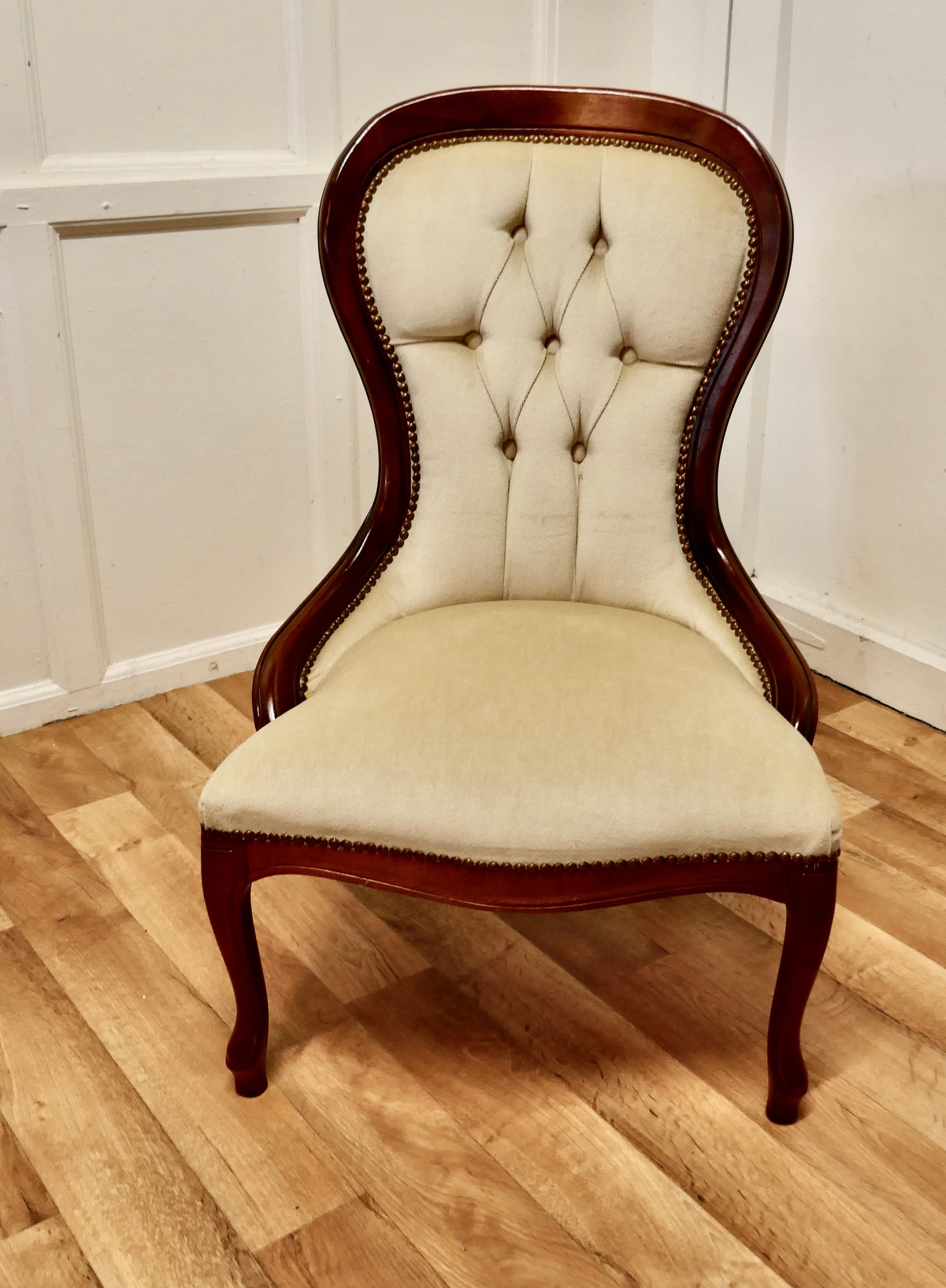 A Good Victorian Style Spoon Back Easy Chair

The chair has a solid frame and it stands on cabriole legs. There is a deeply buttoned back and a broad curved top rail. 
This very comfortable and roomy chair is upholstered with Ivory Coloured