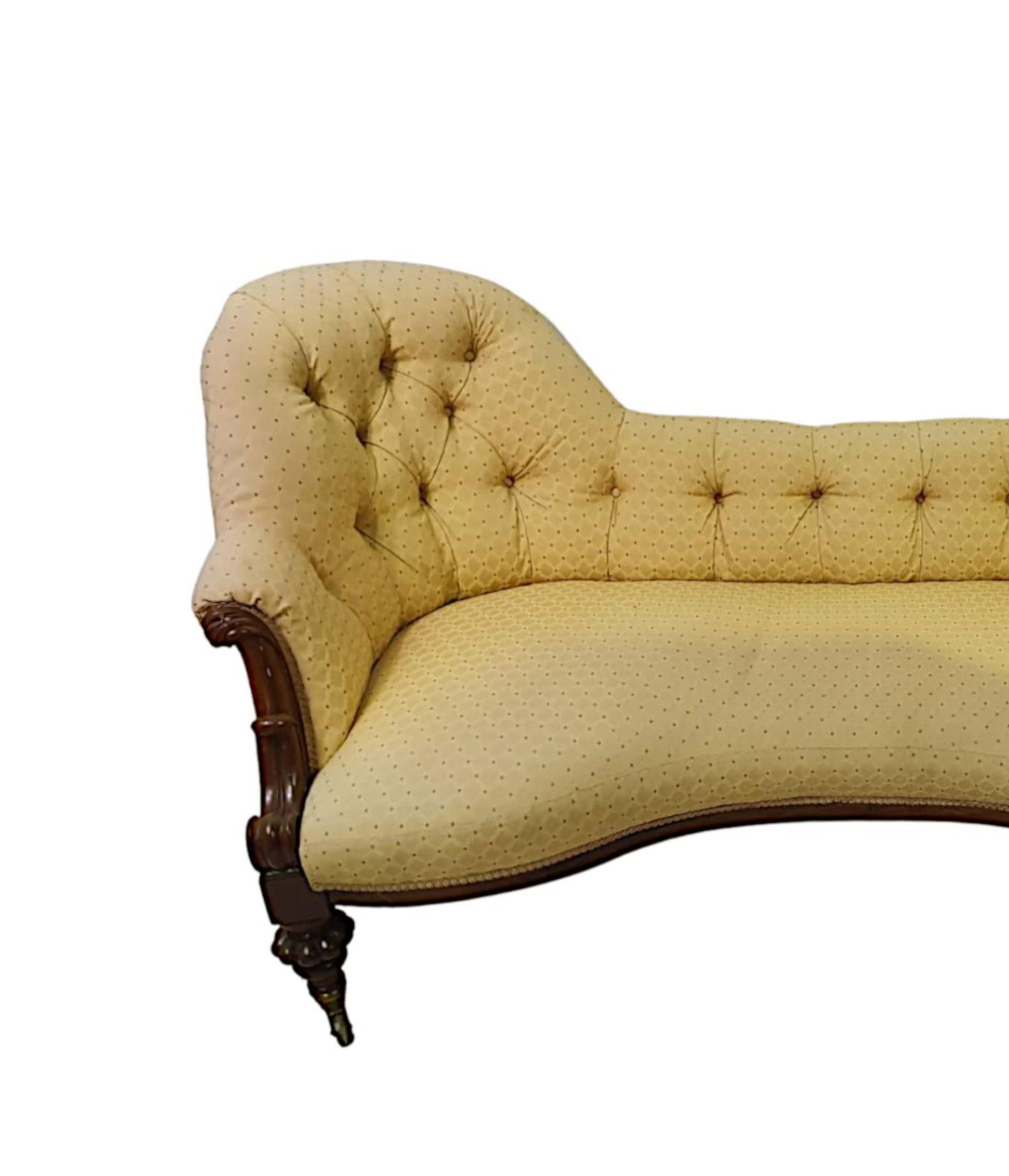 A gorgeous 19th Century fruitwood framed humpback settee. The beautifully shaped button back raised over serpentine seat flanked with finely hand carved scroll arm supports, above simple frieze supported on baluster leg with beautifully detailed