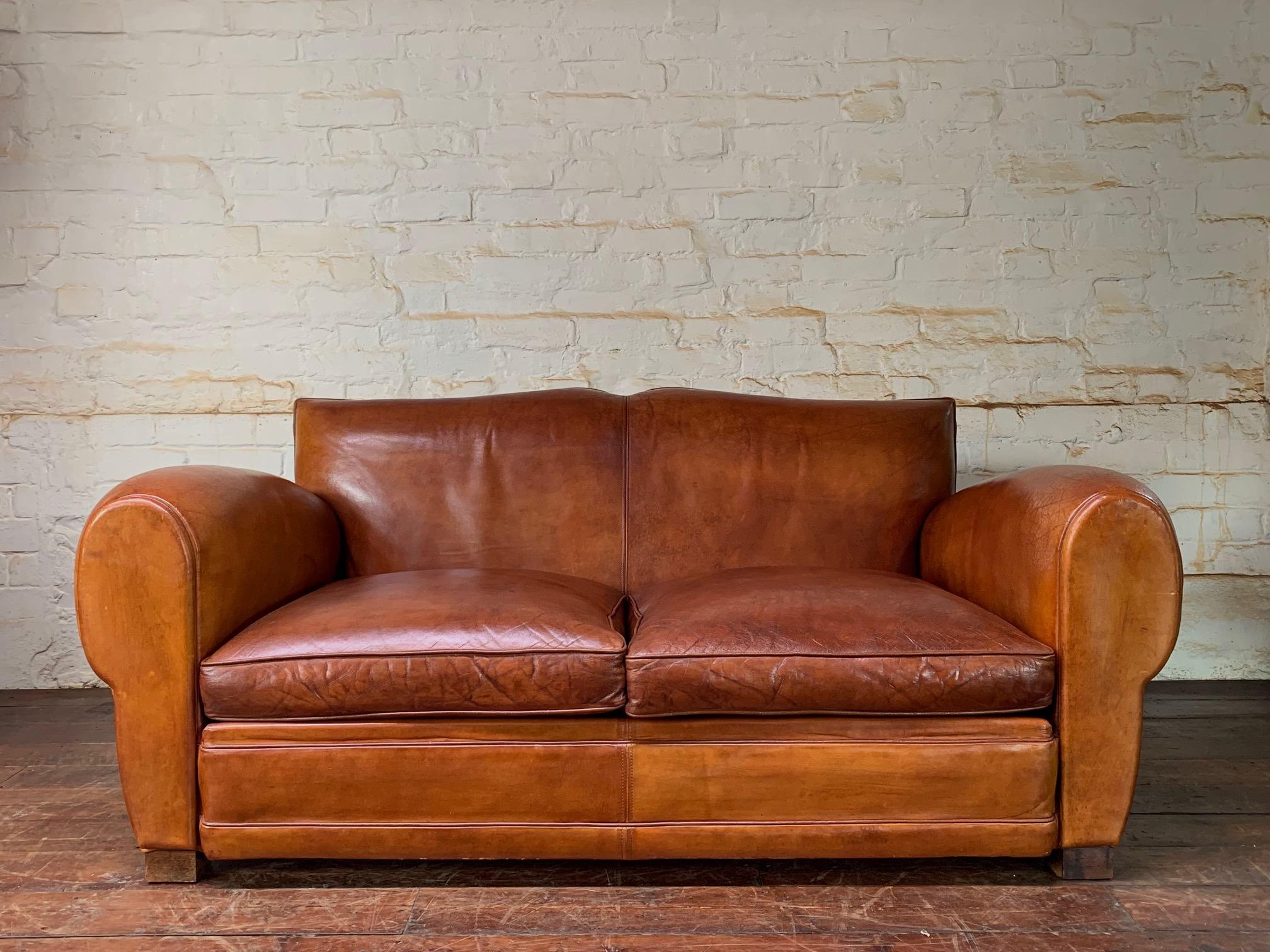 A Gorgeous French Leather Club Salon, Caramel Moustache, Circa 1950’s

This is a rare opportunity to acquire a caramel moustache salon. It is getting increasingly difficult to find original French leather club chairs in good condition, so to be