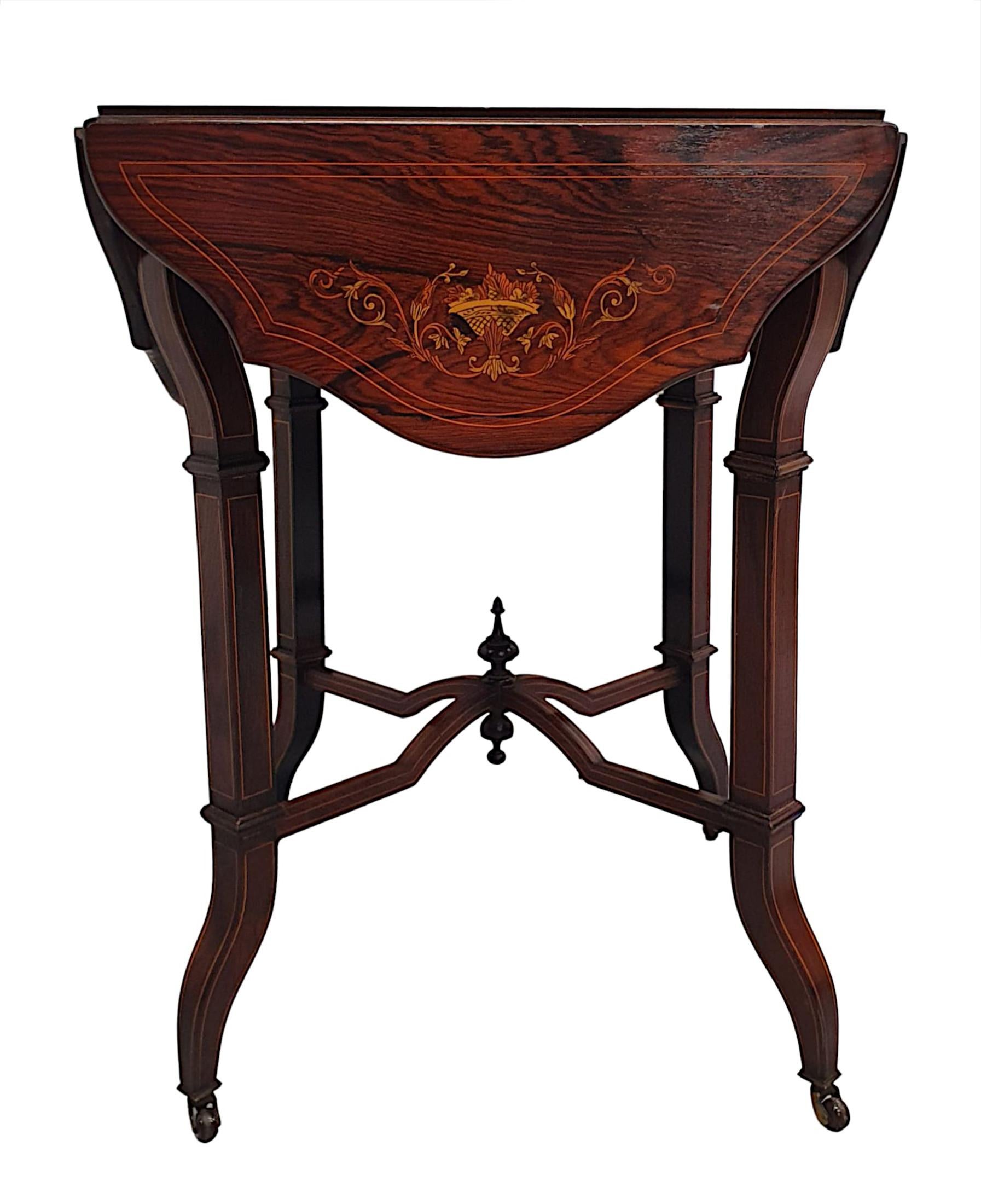 A gorgeous quality late 19th century fruitwood drop leaf lamp or occasional table, line inlaid, richly patinated and with beautiful marquetry panel detail throughout. The moulded top with four drop leaf serpentine, shaped leaves, all with intricate