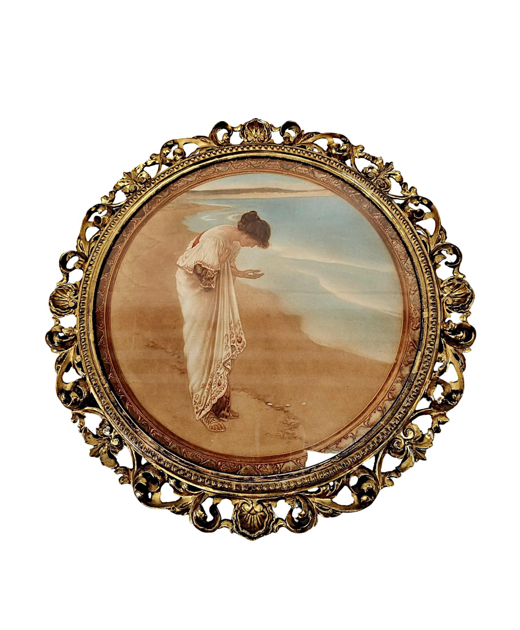 A gorgeous pair of 19th Century giltwood framed prints of circular form, set within a pair of finely hand carved pierced and moulded giltwood frames with stunning scrolling foliate, flowerhead and shell motif detail.  One print depicting a beautiful