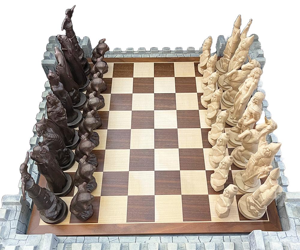 A Gothic chess set made in cast clay

A Gothic chess set with a conversion of a standing wall, which lifts the Chess board. The wall pieces and figures are made of casting clay. The wall is divided into a few pieces. Four corner pieces and four long