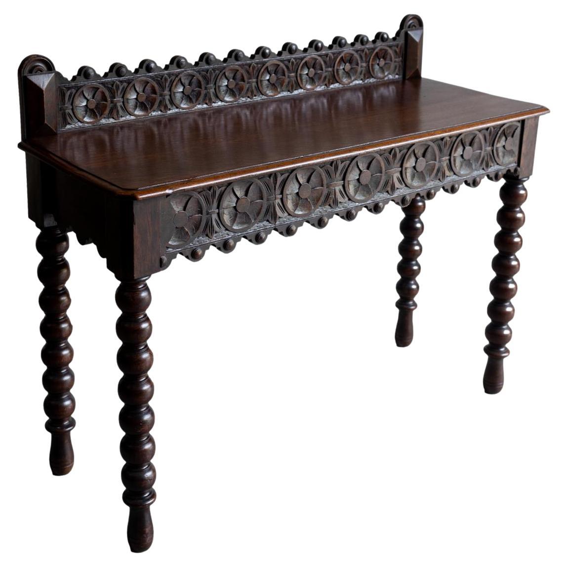 A Gothic Hand-Carved Oak Console Table, Hidden Frieze Drawer, English, ca. 1870 For Sale
