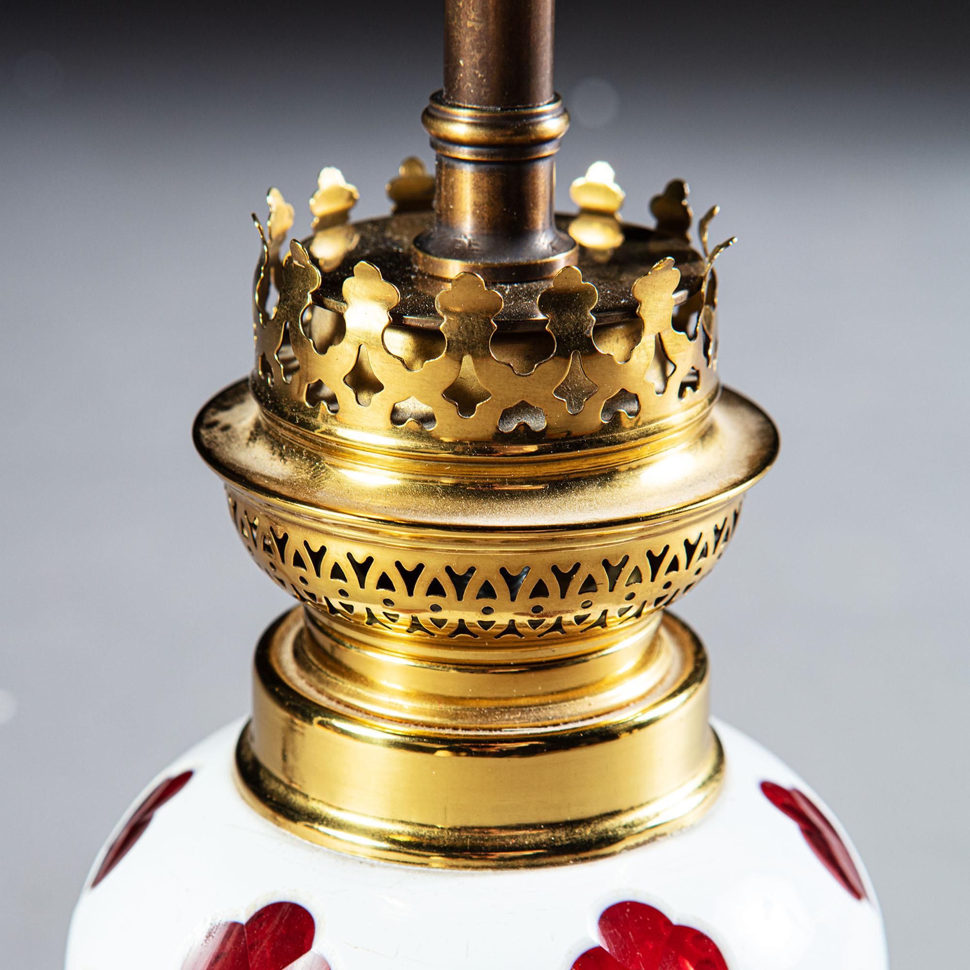 English Gothic Red and White Glass Lamp with Brass Base For Sale