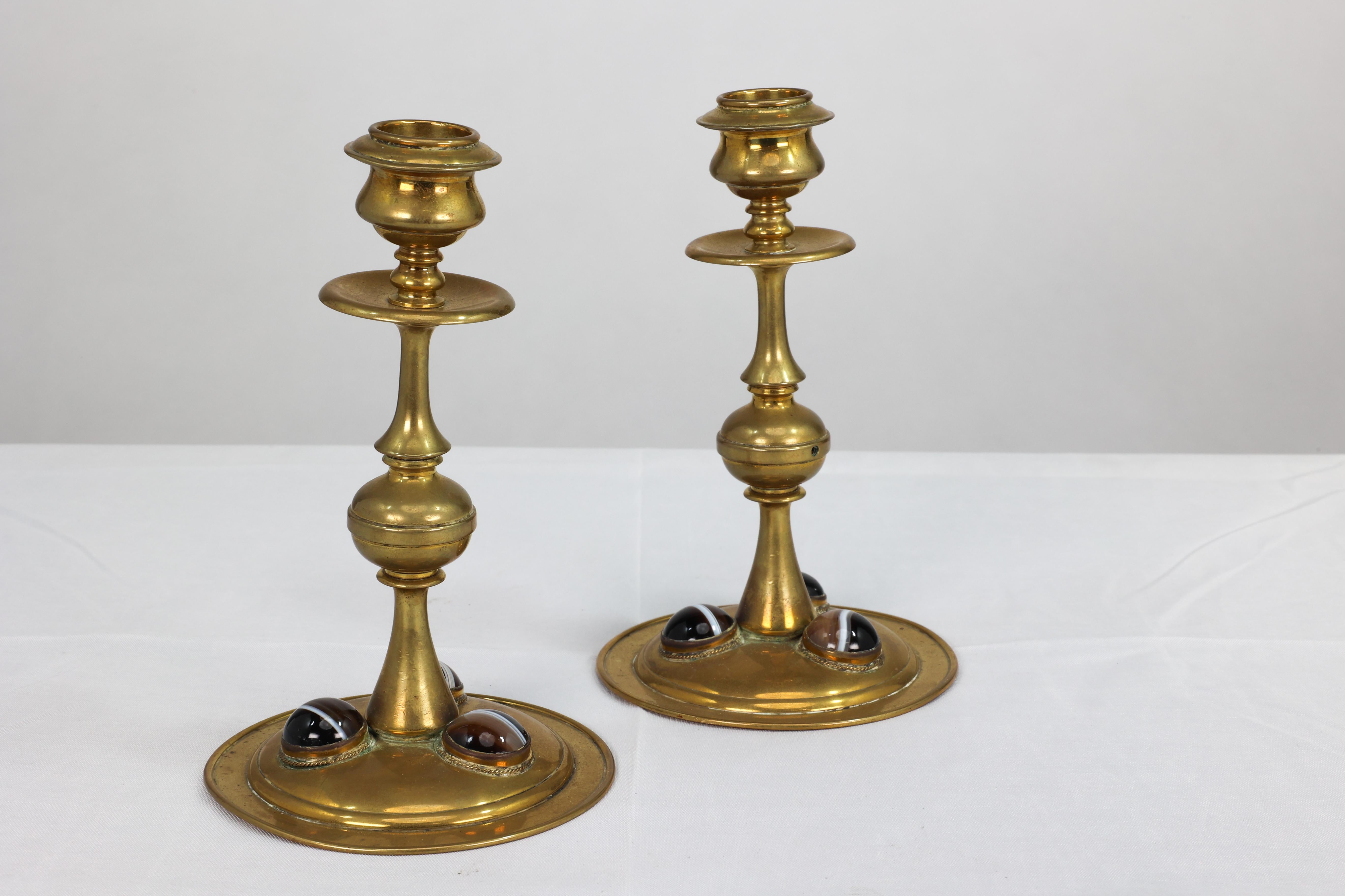English Gothic Revival brass desk set with a pair of candlesticks & a matching pen tray. For Sale
