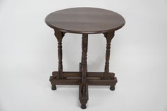 Alfred Waterhouse. A Gothic Revival oak side table with double cross stretchers.