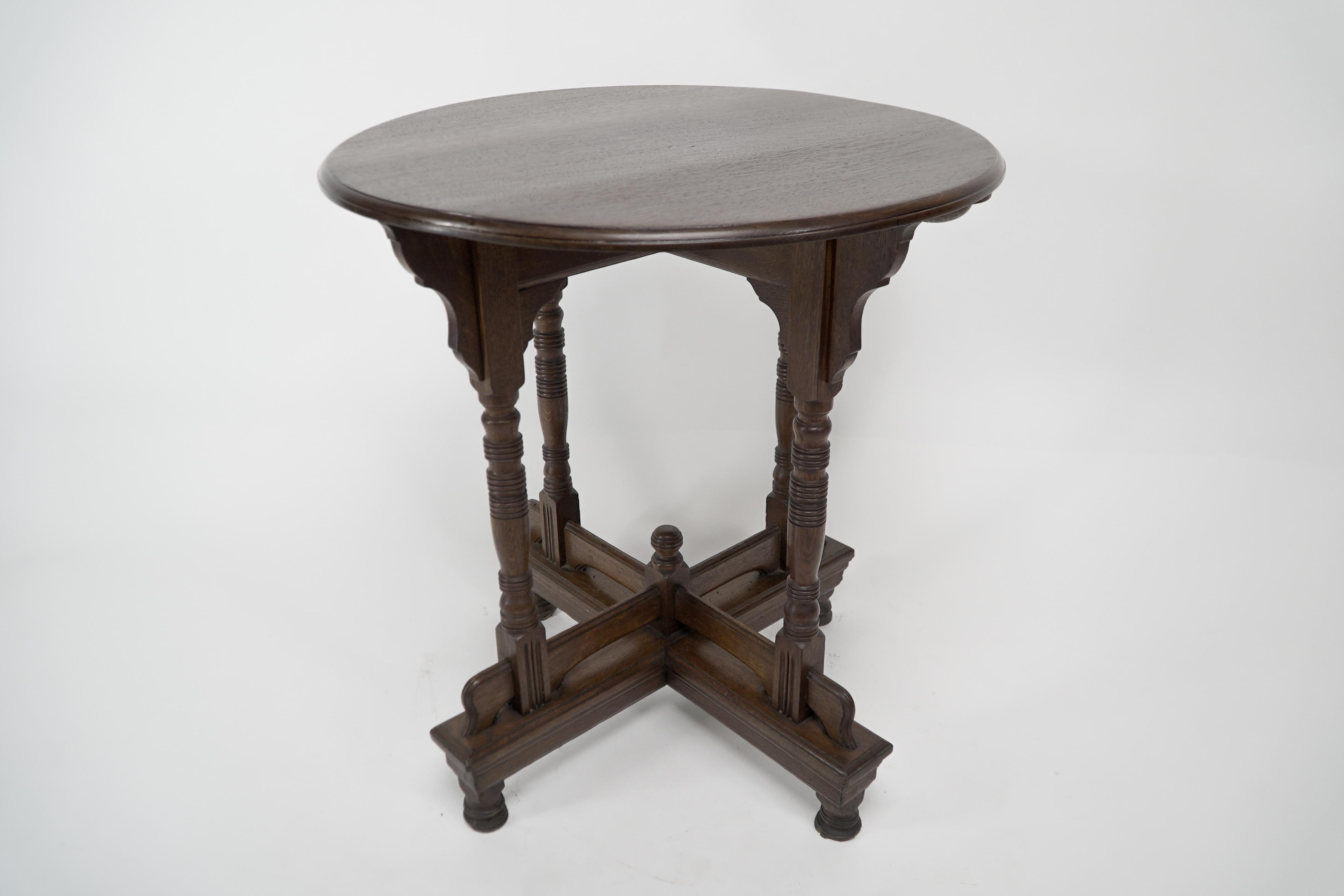 Late 19th Century Alfred Waterhouse. A Gothic Revival oak side table with double cross stretchers. For Sale
