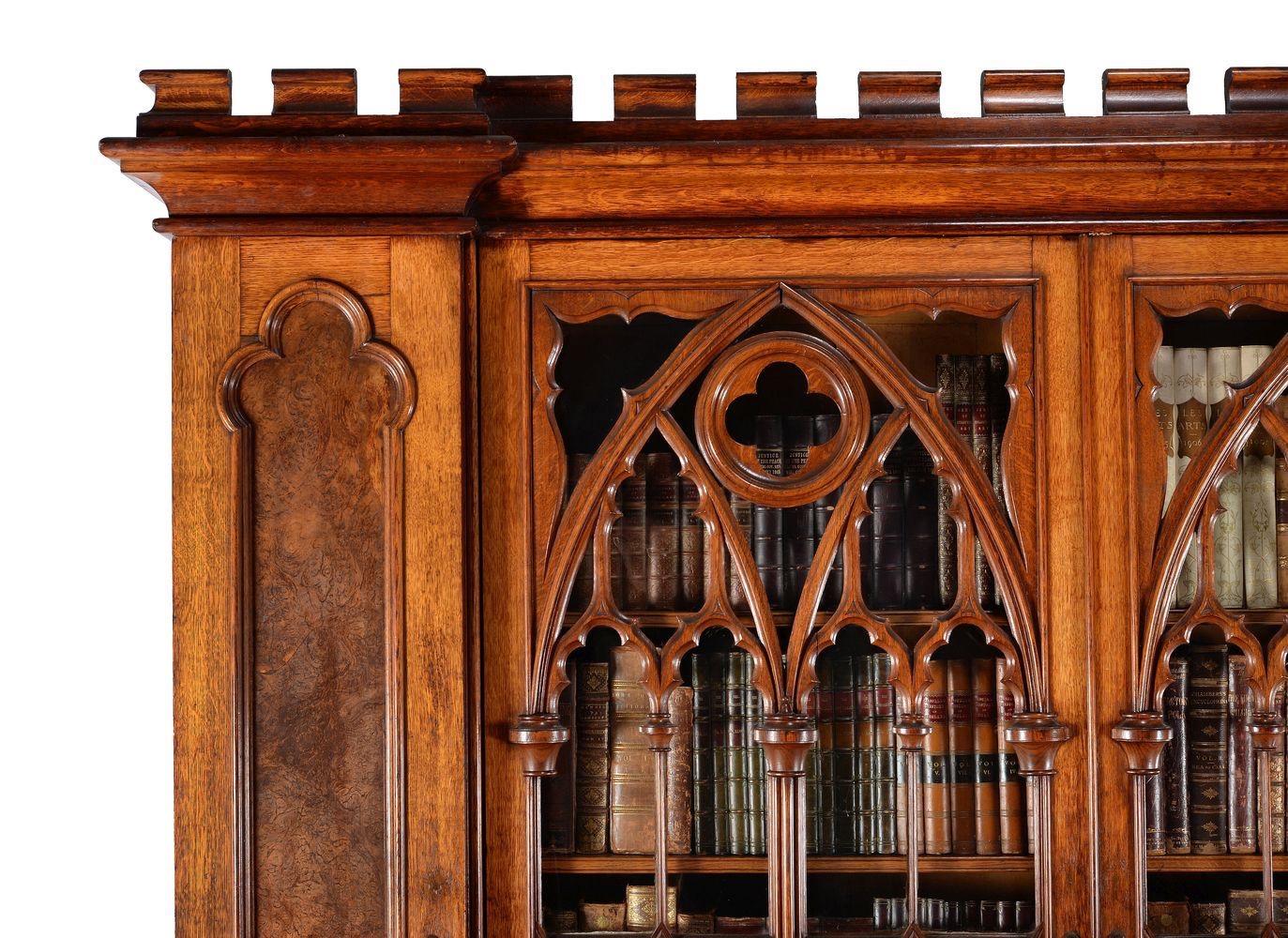 A stunning and magnificent example of a Gothic Revival oak and pollard oak cabinet bookcase, circa 1880, this is an amazing piece and would grace any of the countries cathedrals or stately homes.
This beautiful bookcase is of inverted breakfront