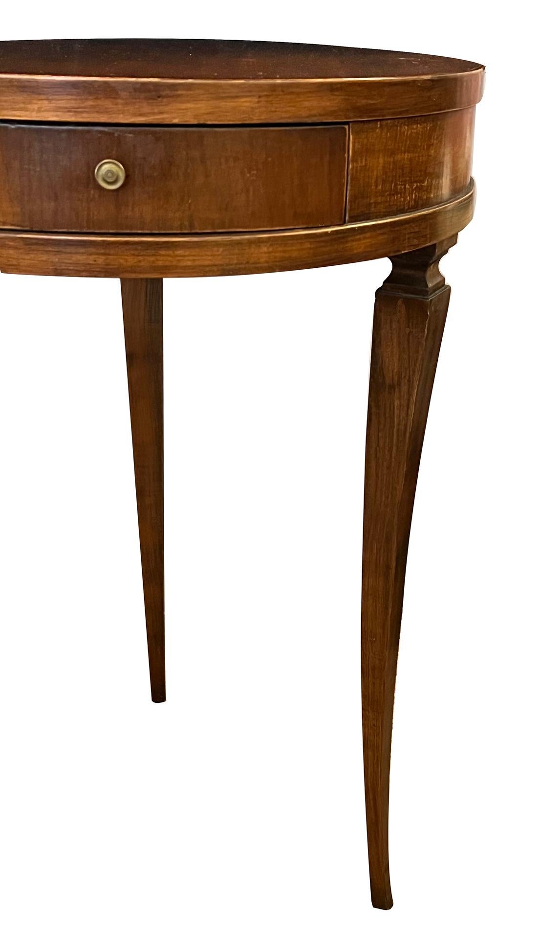 A Graceful Italian Neoclassical Style Beechwood Circular Single-drawer Side Tabl In Good Condition For Sale In San Francisco, CA