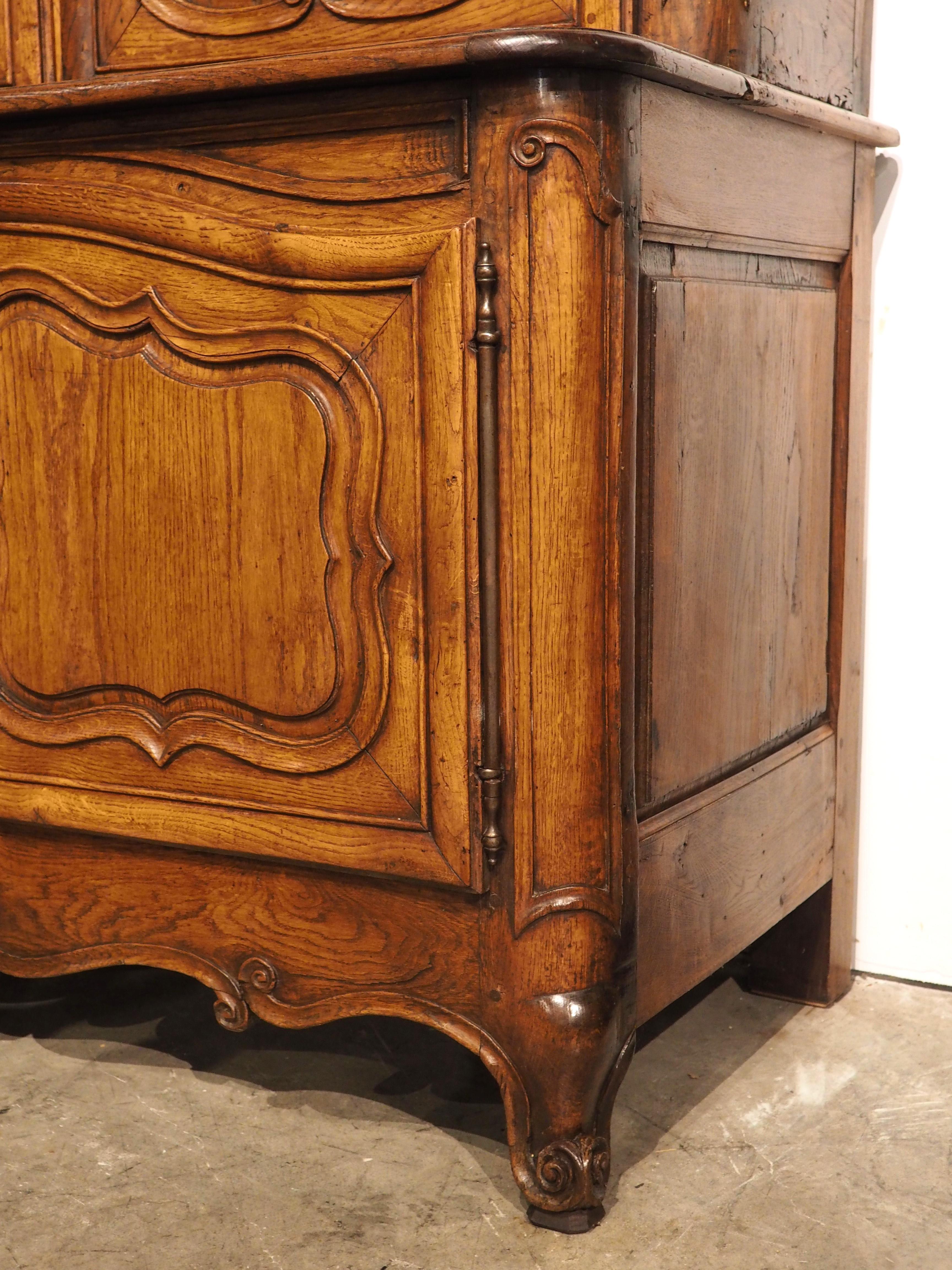 Hand-Carved A Grand 18th Century French Oak Buffet Deux Corps from the Perche Region For Sale