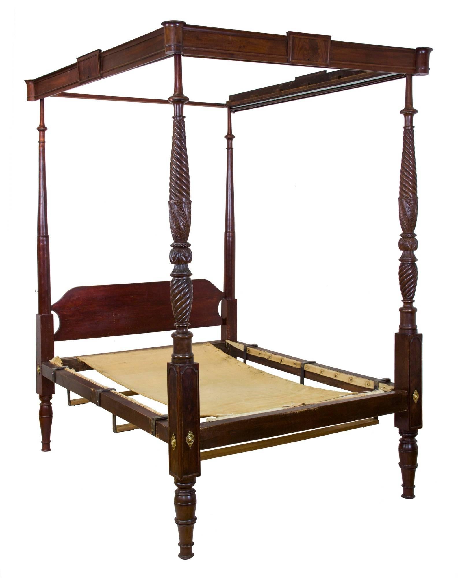 This is a grand mahogany tall post bed with a fully developed canopy framed in mahogany. Many of these beds were not made with elaborate canopies as such; this was an expensive option. This bed has had the canopy set up to accept a valance attached