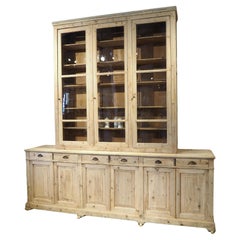 A Grand French Antique Scaped Pine Bibliotheque Vitrine Deux Corps, Circa 1900