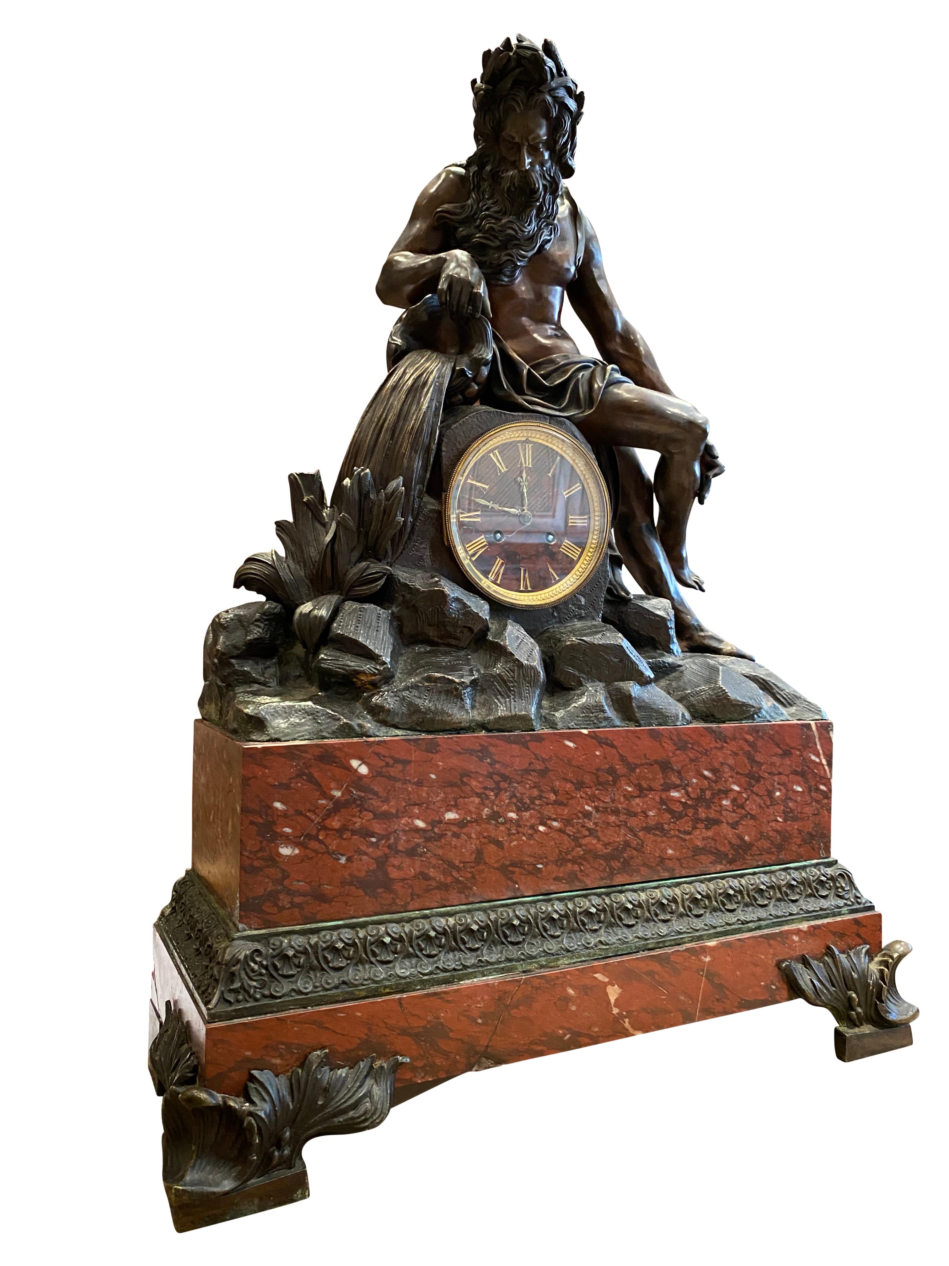 Empire Grand French Gilt and Patinated Bronze Mantle Clock on a Marble Imperial Base For Sale