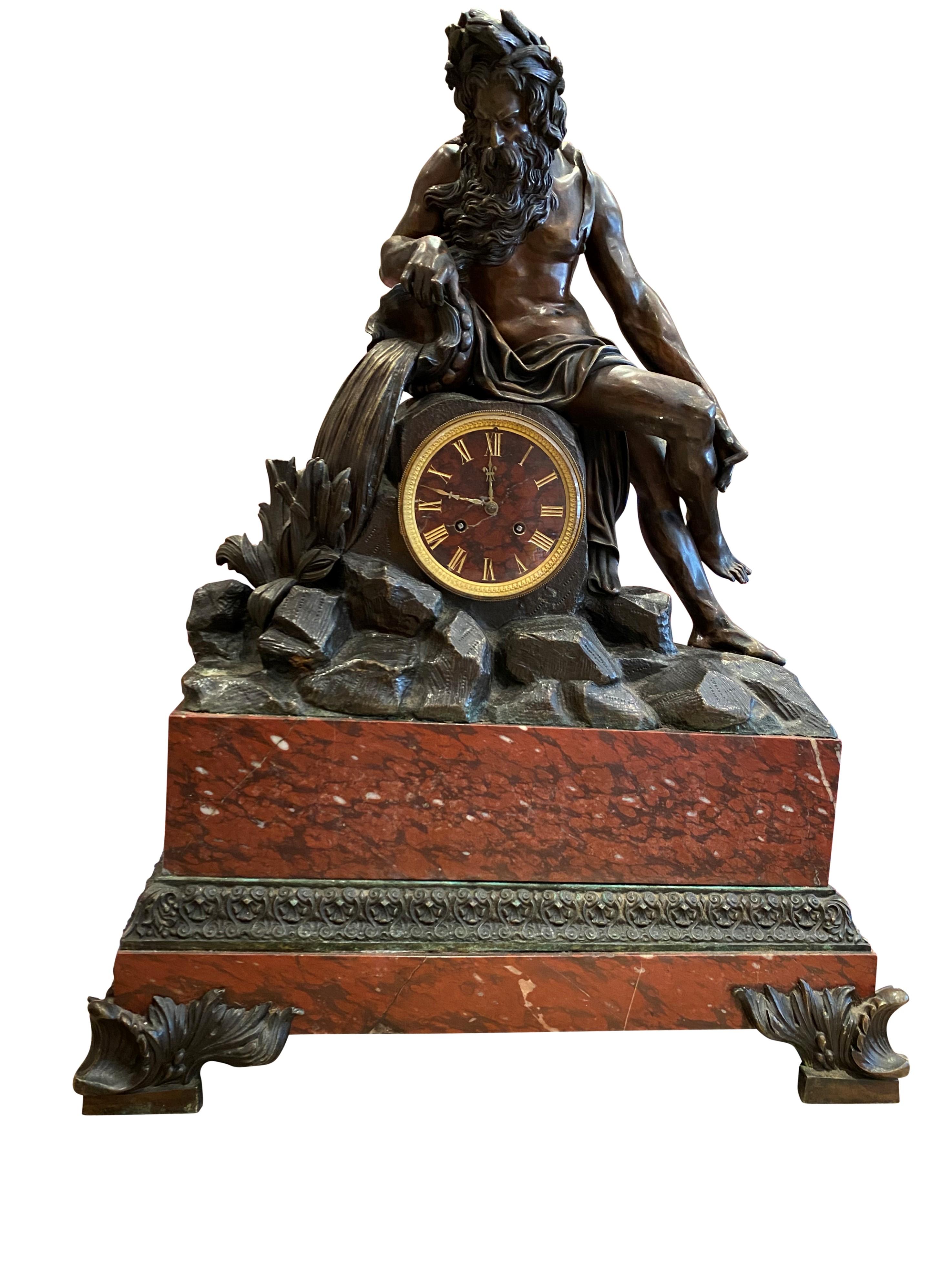 Grand French Gilt and Patinated Bronze Mantle Clock on a Marble Imperial Base In Good Condition For Sale In London, GB